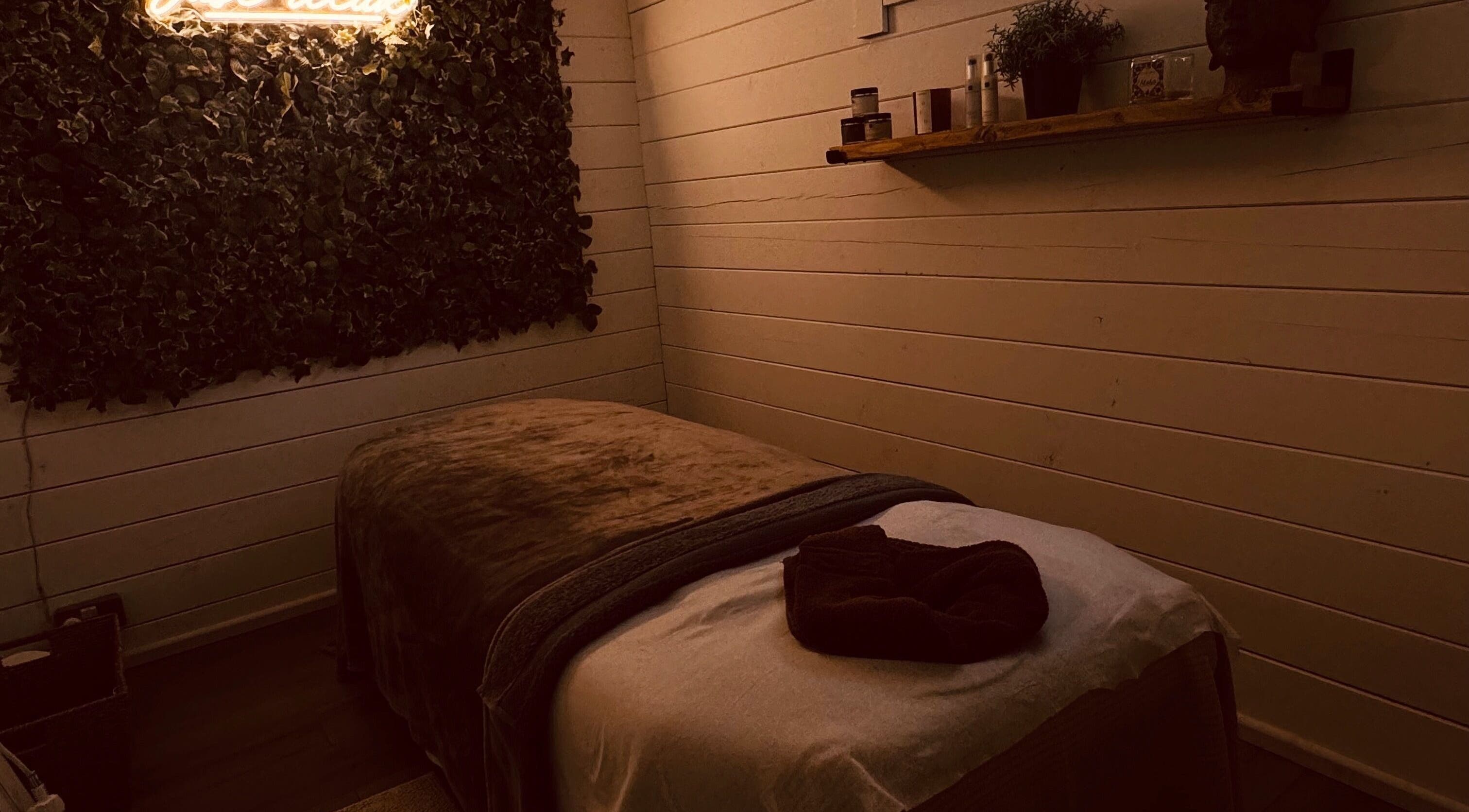 Tranquil treatment room at Beautique Beauty Studio, Warninglid, England, GB with plush bed and cozy ambiance.