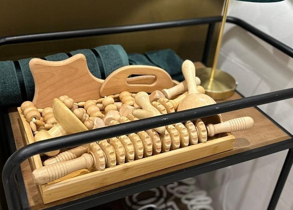 Wooden massage tools on display at Elite Emerald Spa, London, England, GB, showcasing relaxation expertise.