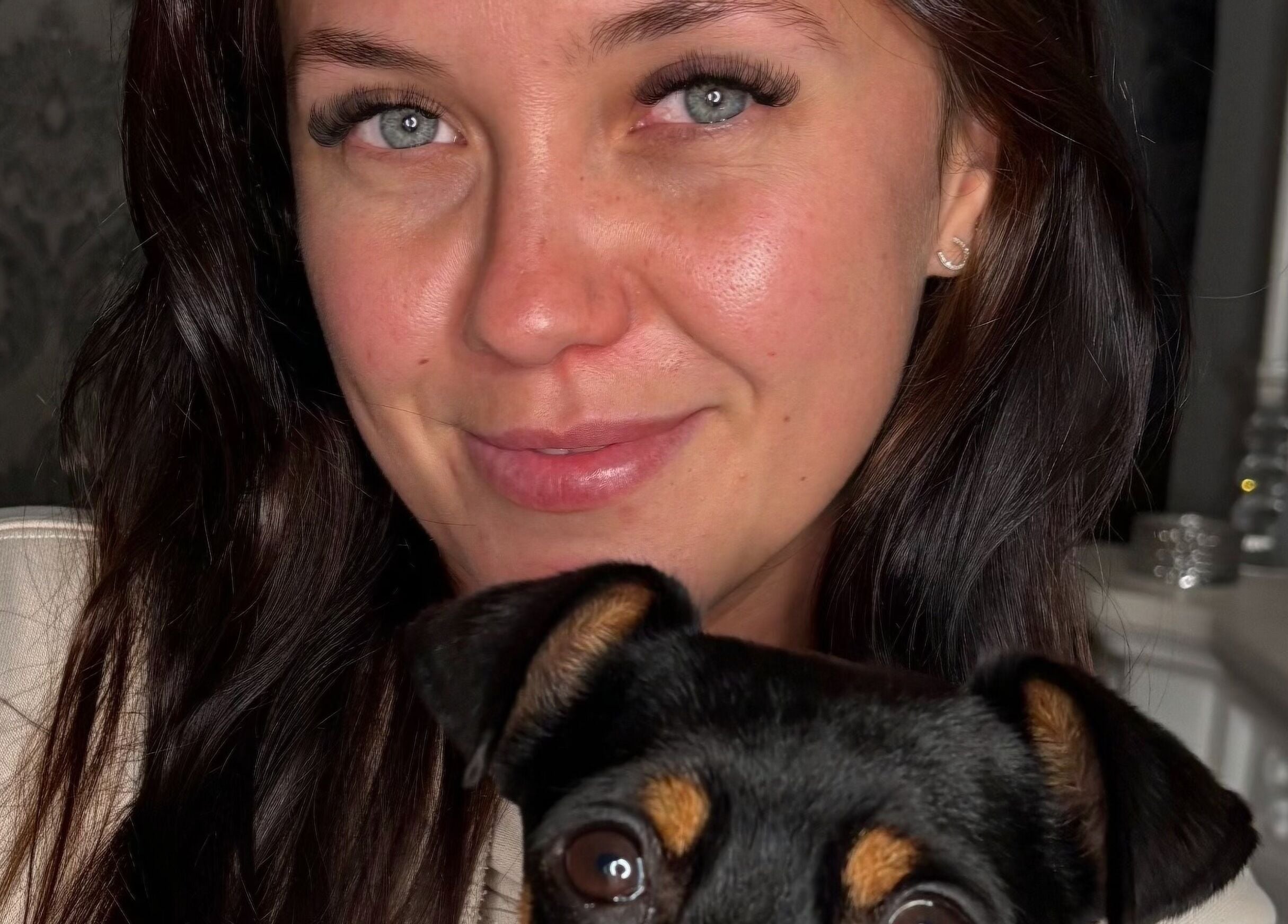 Woman with a dog at Beautyblissbymia_, London, England, GB. Perfect setting for beauty and relaxation.