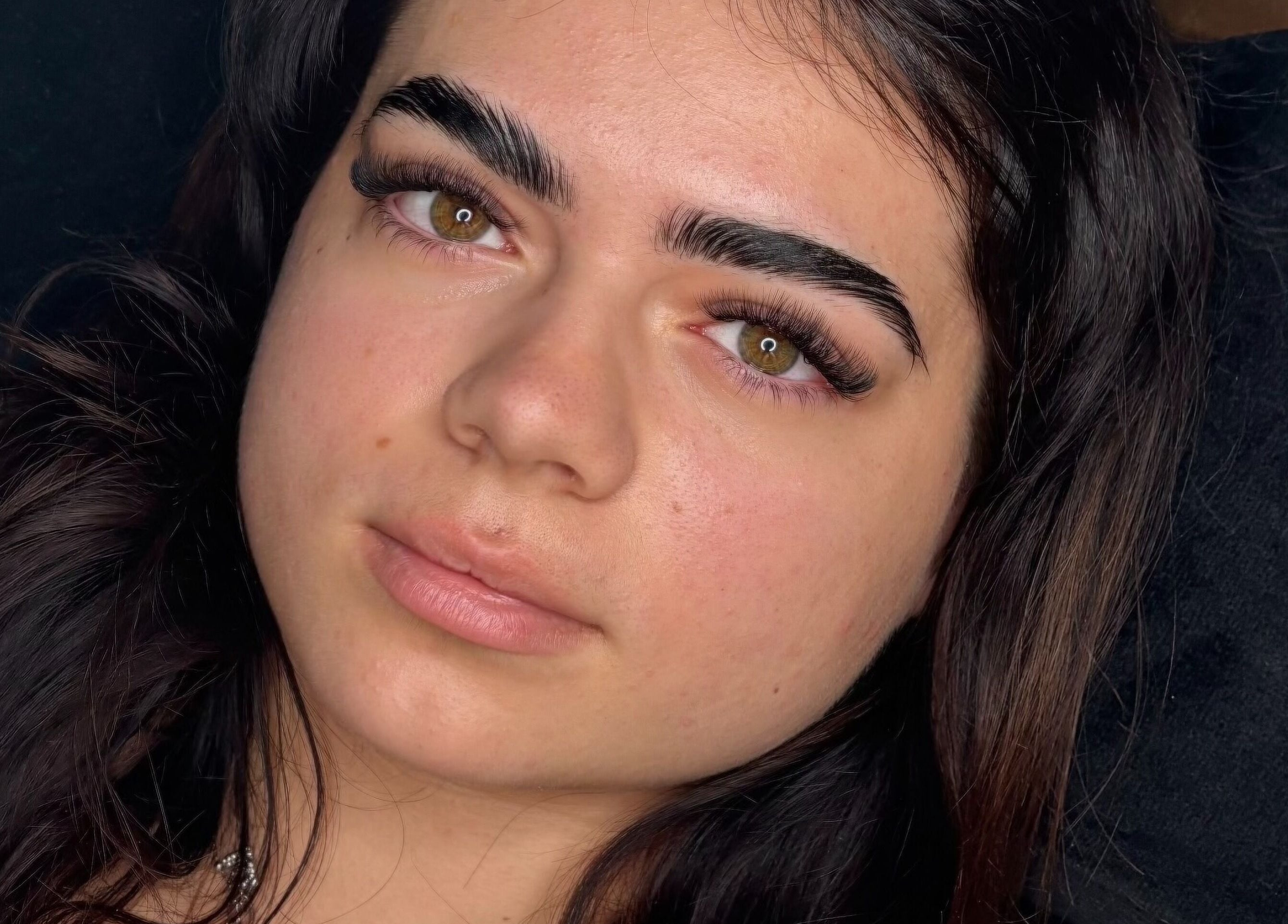 Close-up of a woman's beautifully styled eyelashes at Beautyblissbymia_ in London, England, GB.