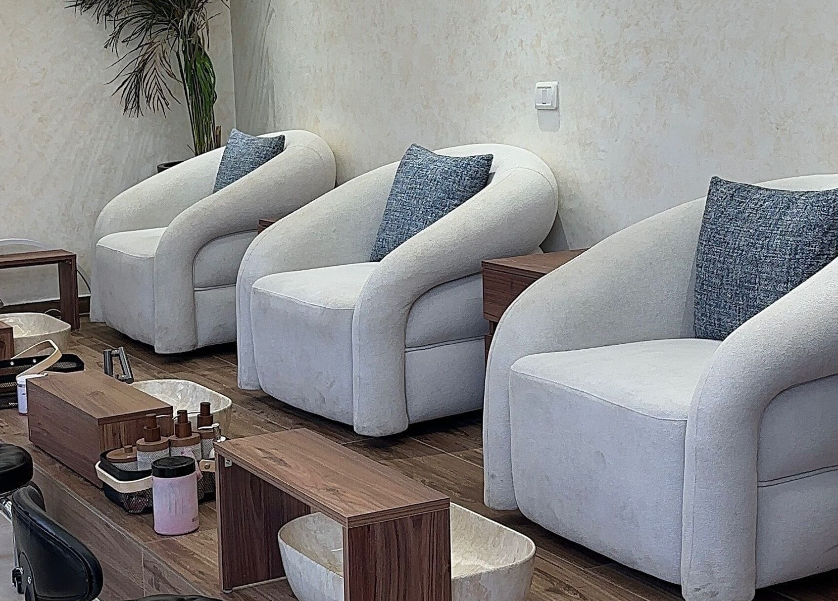 Elegant pedicure chairs at Joelle Beauty Lounge, Bayrut, LB showcasing plush comfort and style.