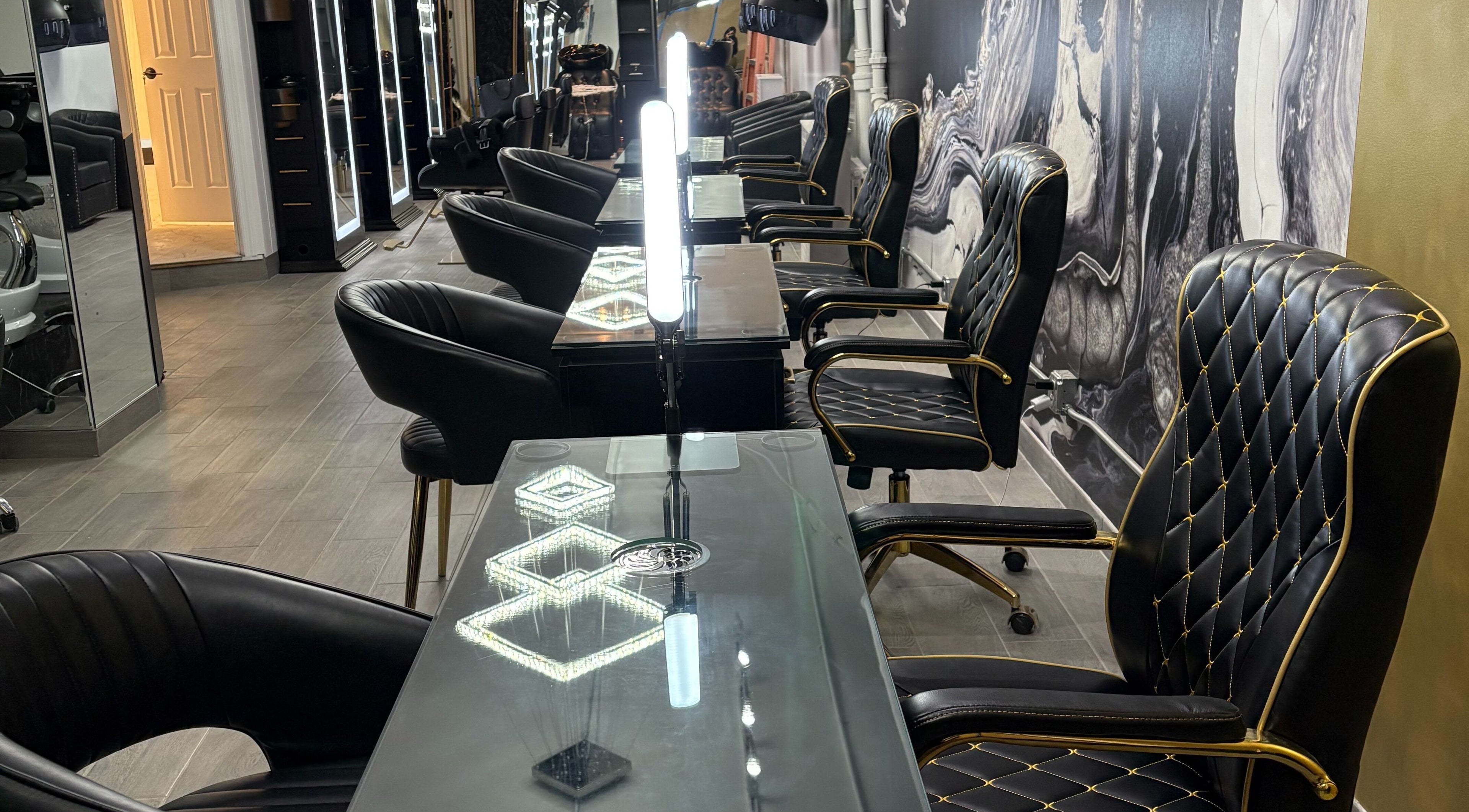 Luxurious salon chairs and mirrors at Vanity Me Beauty Bar, New York, New York, US.