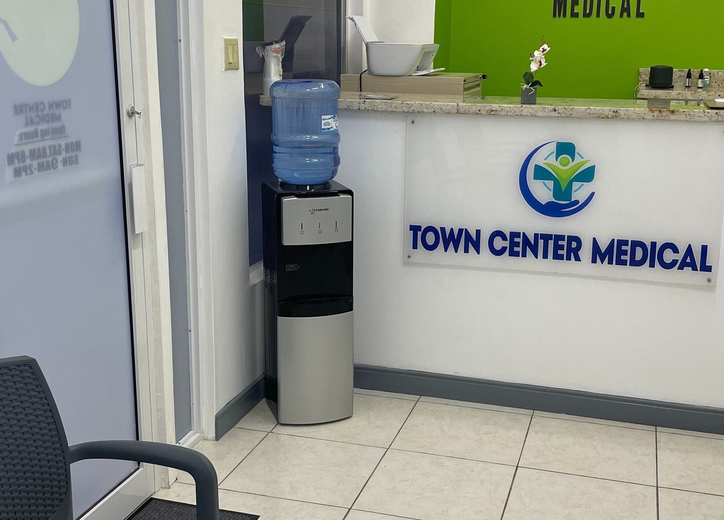 Reception area of Town Center Medical in Saint Ann's Bay, St. Ann Parish, JM with water dispenser.