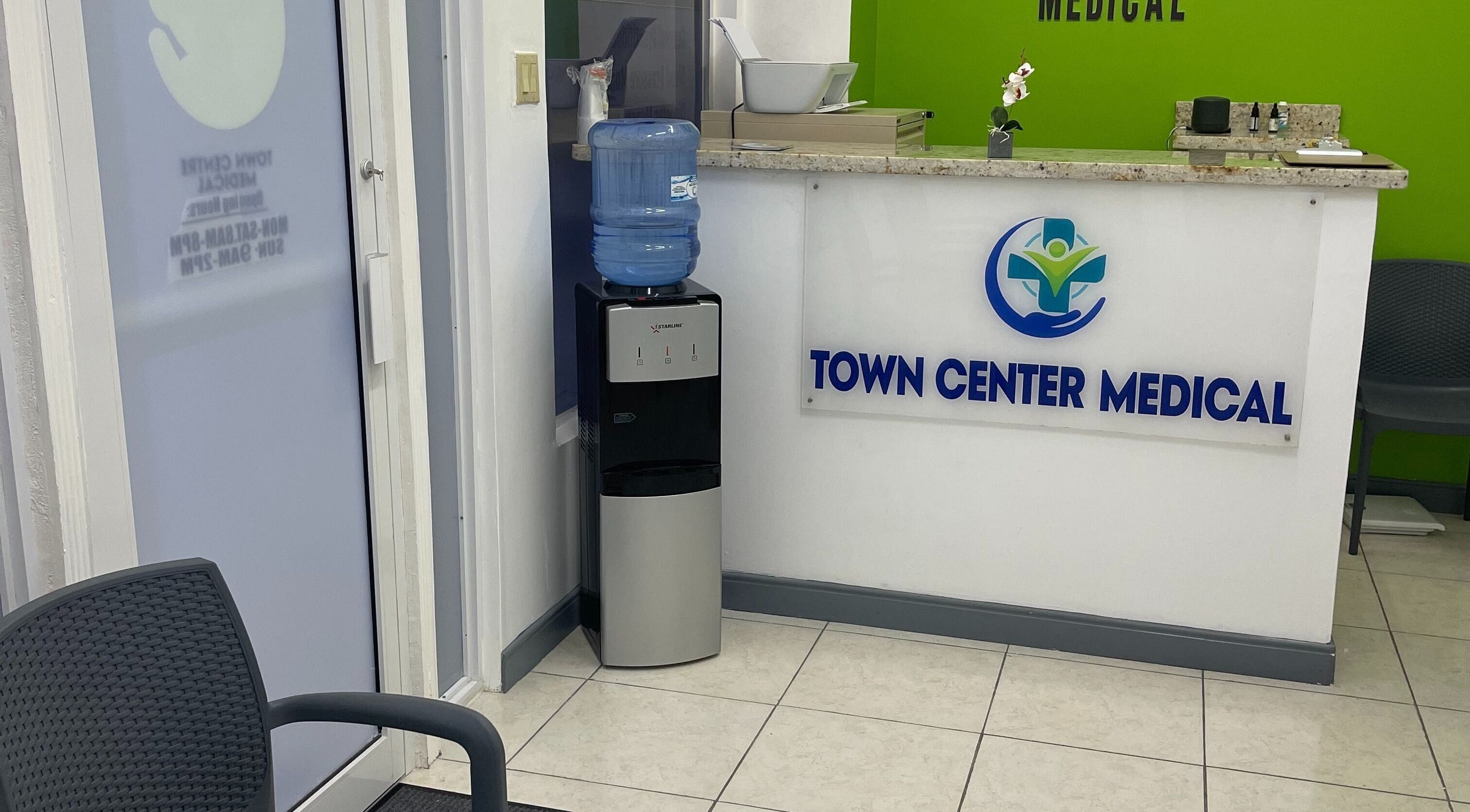 Reception area of Town Center Medical in Saint Ann's Bay, St. Ann Parish, JM with water dispenser.