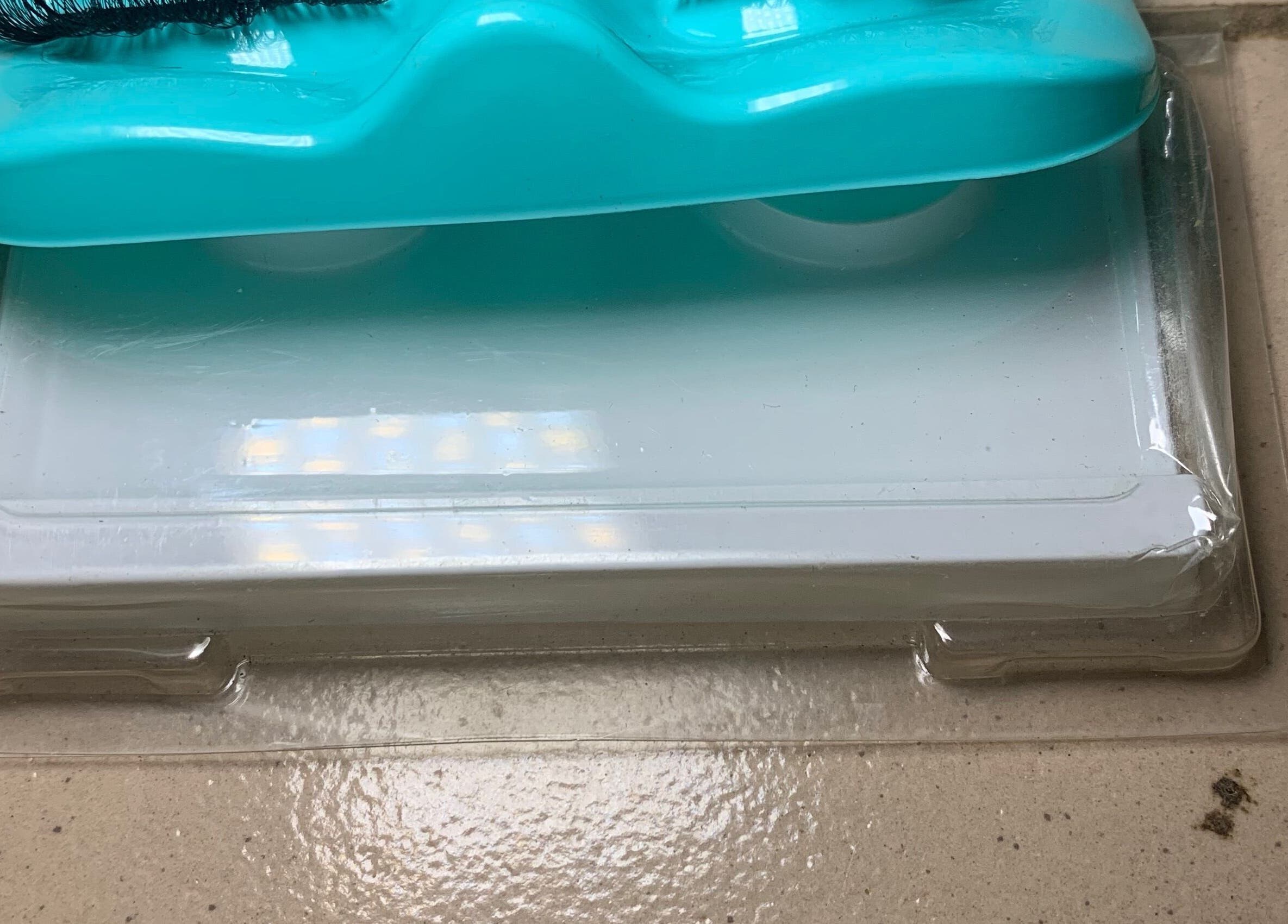 Blue cleaning brush at Jhays Essence, Lagos, Lagos, NG, showcasing sleek packaging.