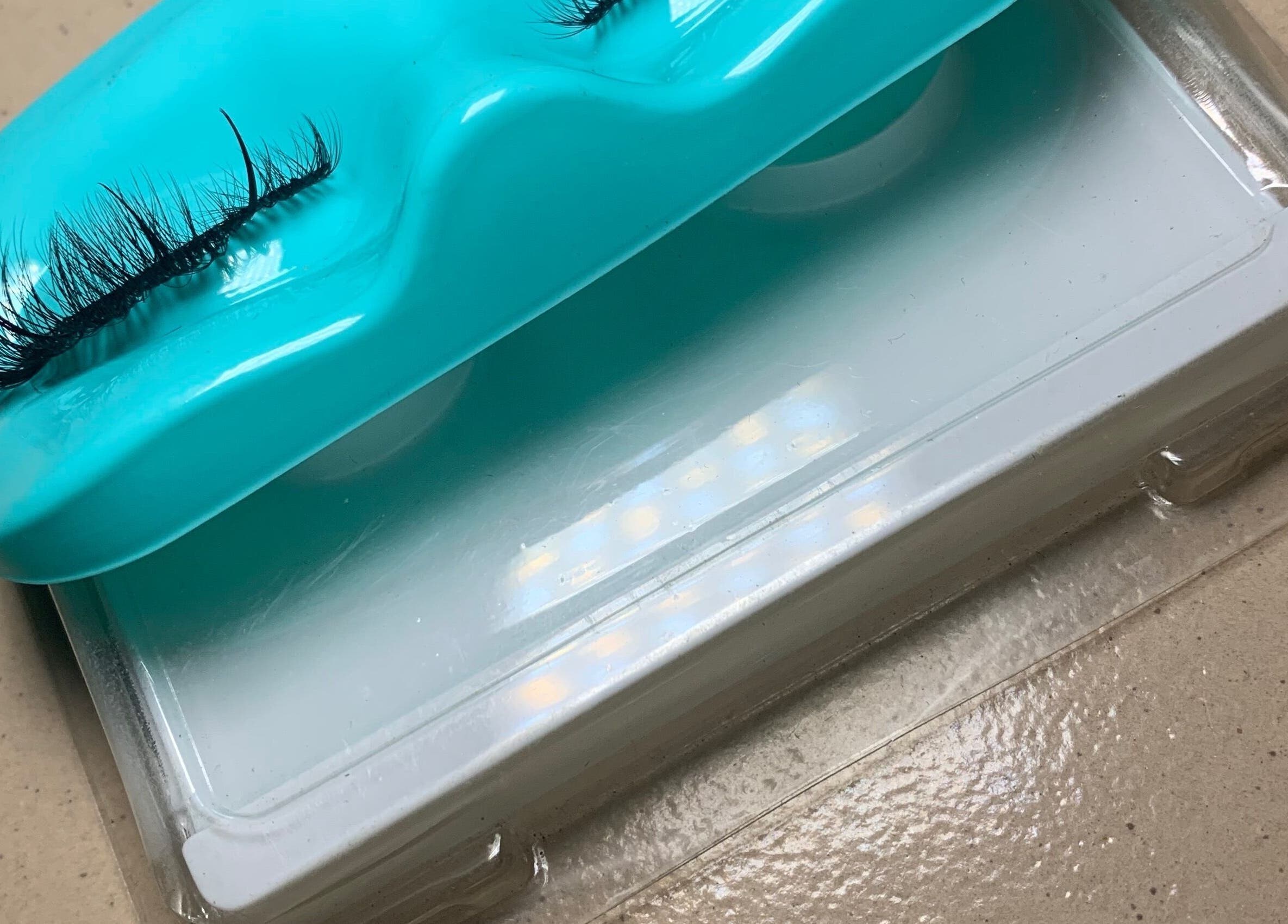 Close-up of eyelash extension in a teal box at Jhays Essence, Lagos, Lagos, NG
