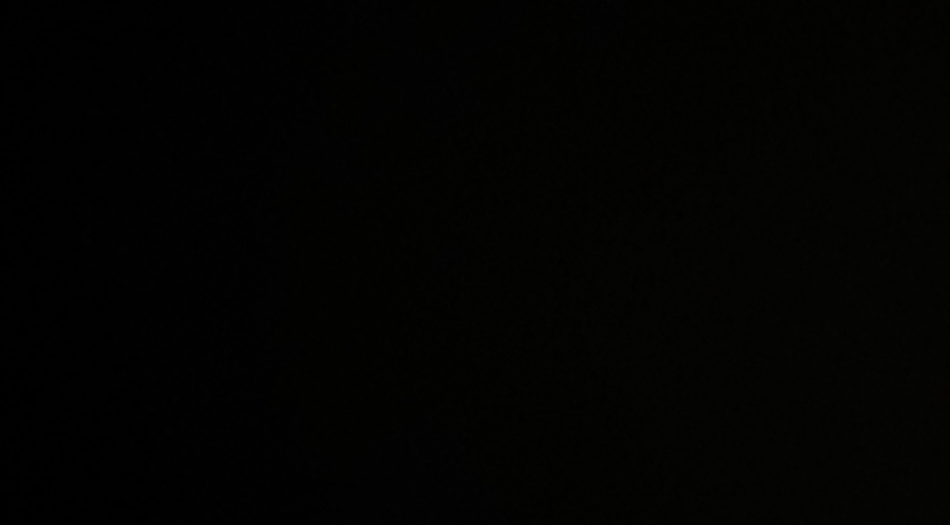 Interior view of Kennycutit, a modern beauty salon in Glendale, Arizona, US showcasing sleek design.