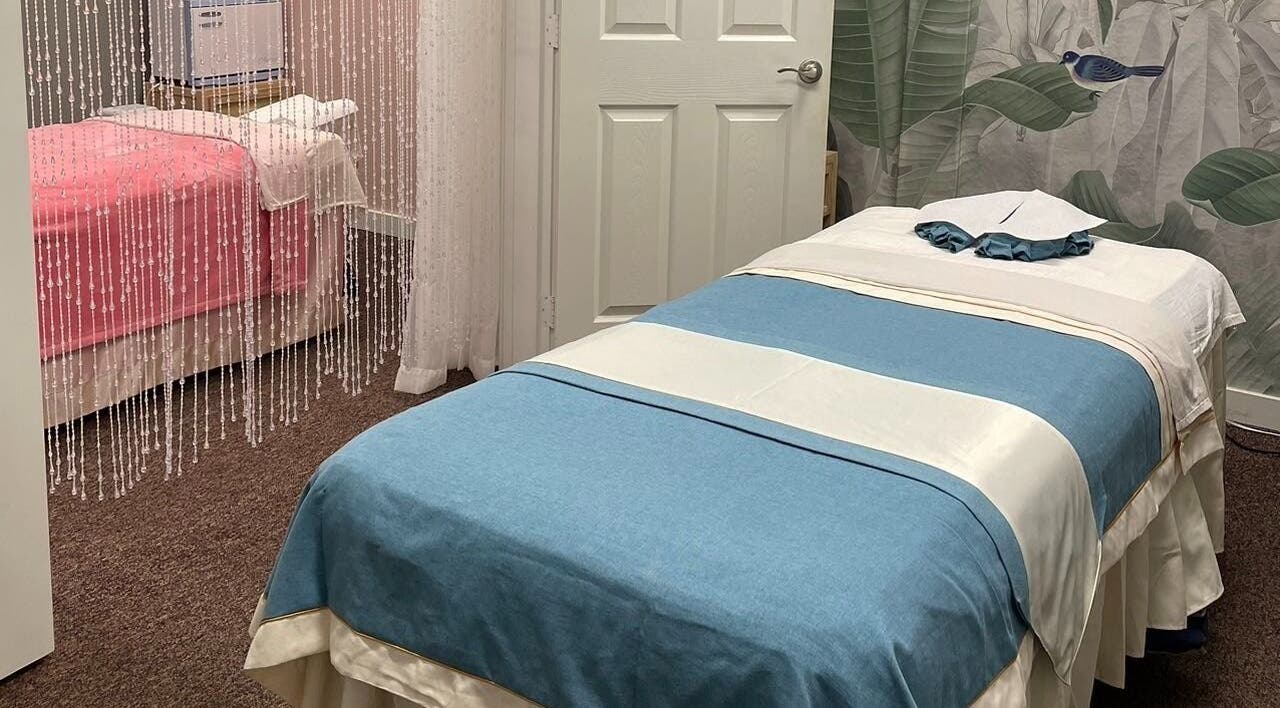 Tranquil massage room at Yuan Massage in Keizer, Oregon, US, featuring elegant decor and peaceful ambiance.