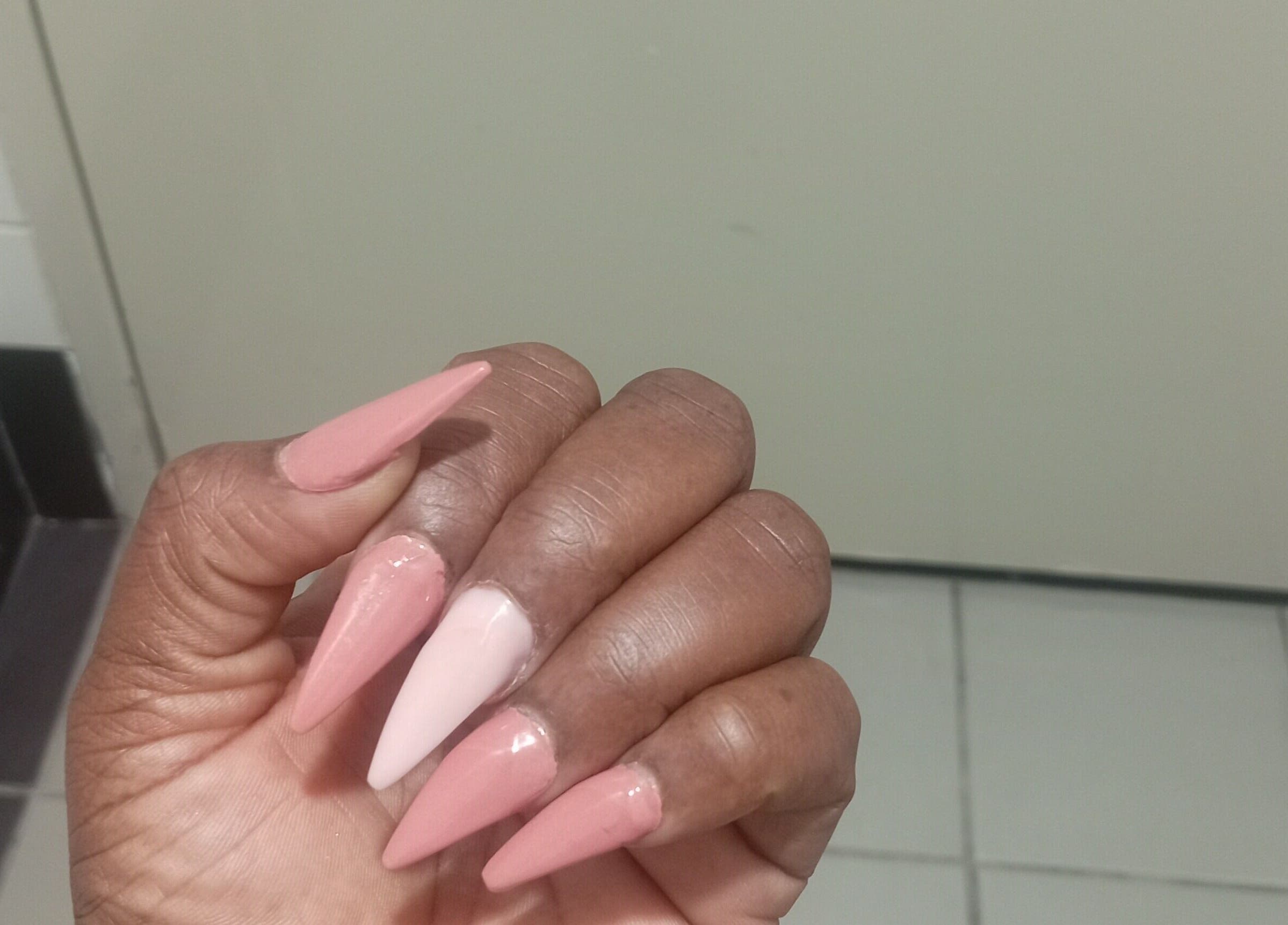 Stylish pink acrylic nails at Excellence Nail Beauty Spar in Johannesburg, Gauteng, ZA.