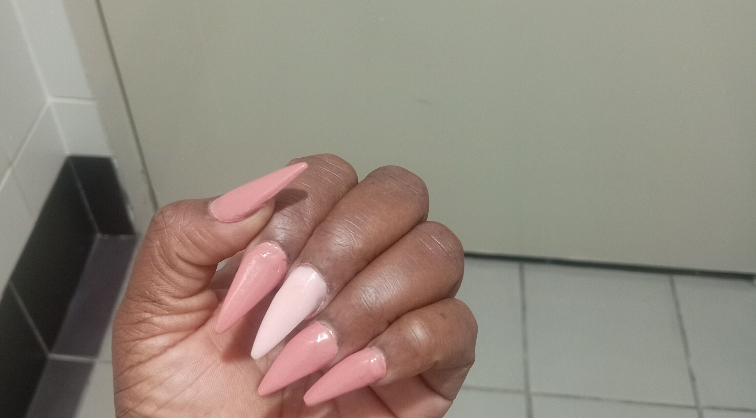 Stylish pink acrylic nails at Excellence Nail Beauty Spar in Johannesburg, Gauteng, ZA.