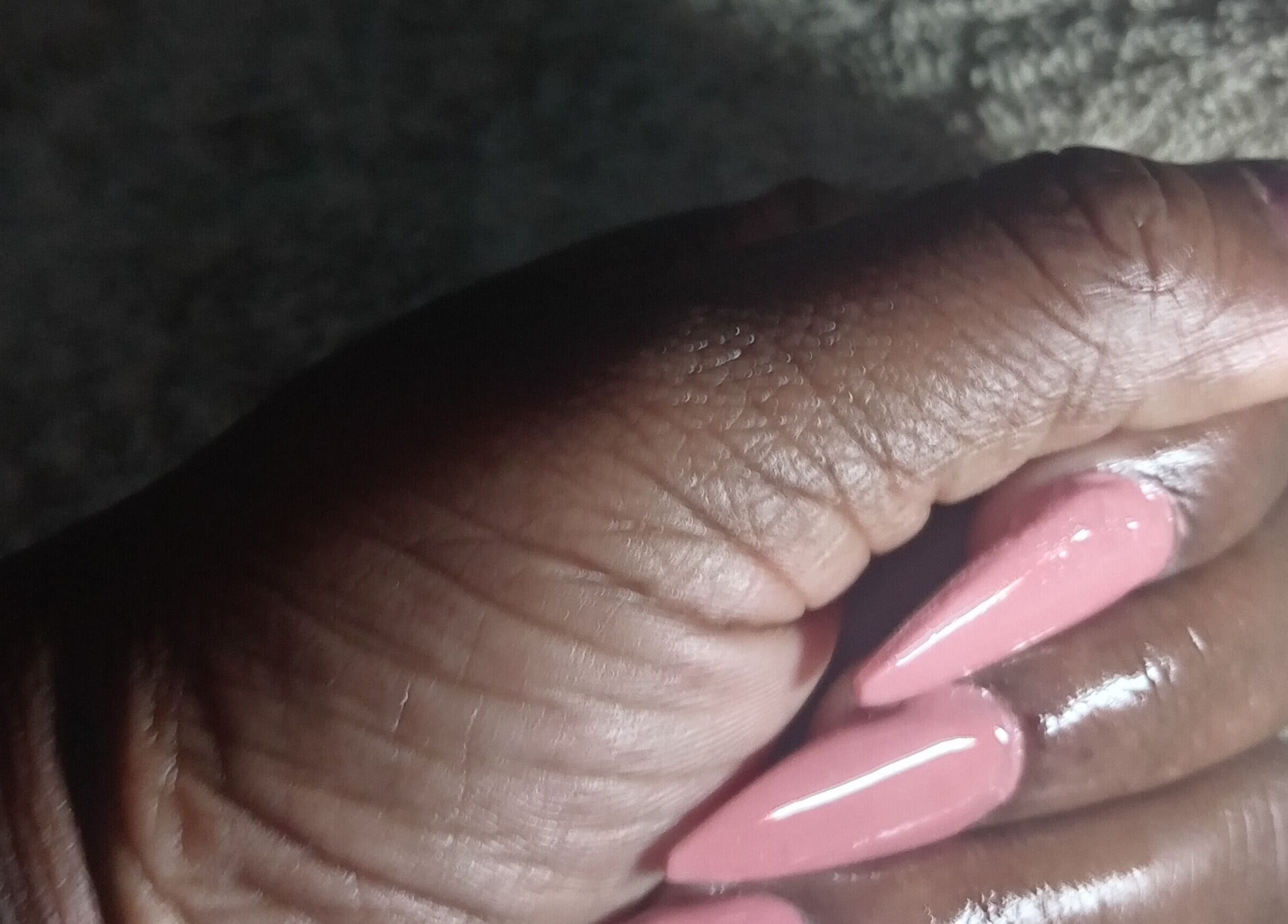 Close-up of glossy pink nails from Excellence Nail Beauty Spar, Johannesburg, Gauteng, ZA.