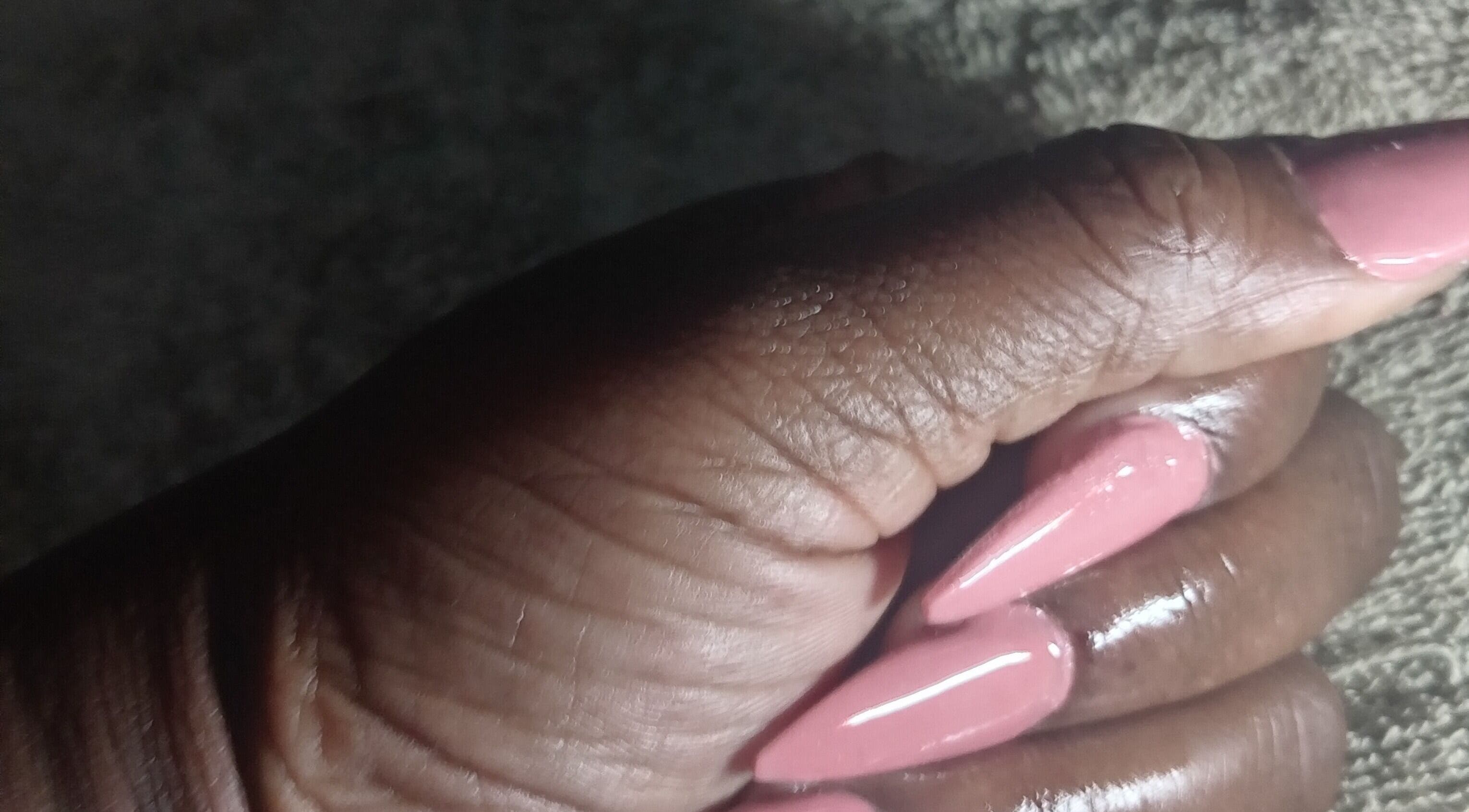 Close-up of glossy pink nails from Excellence Nail Beauty Spar, Johannesburg, Gauteng, ZA.