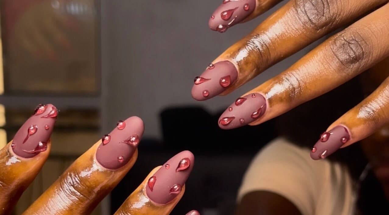 Intricate nail art with glossy pink droplets at The Beys Signature, Lagos, Lagos, NG.