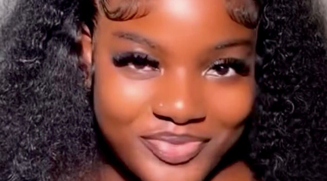 A woman with curly hair and radiant skin at The Beys Signature, Lagos, Lagos, NG.