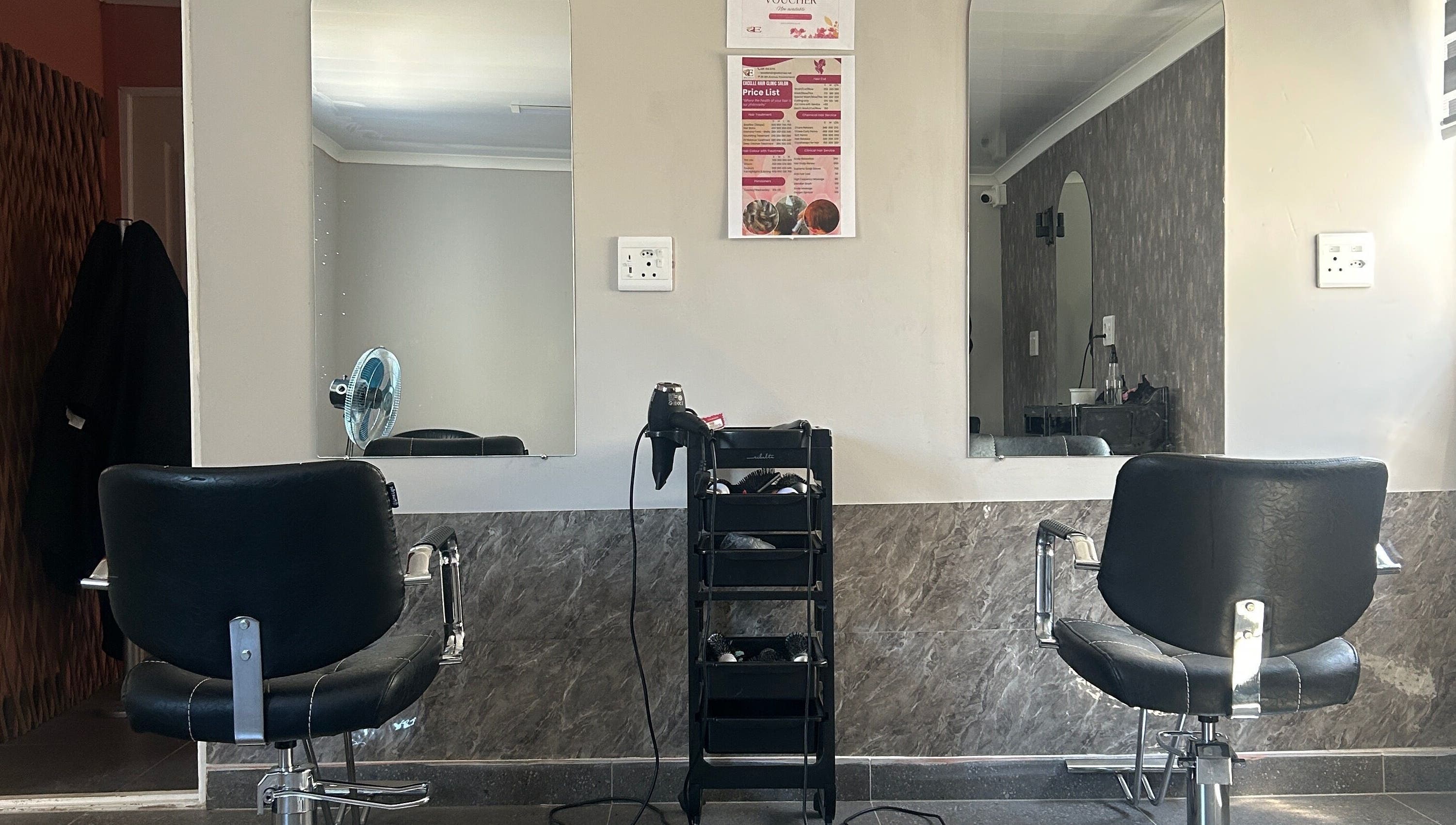 Elegant salon chairs at Excelle Hair Clinic And Training, Cape Town, Western Cape, ZA, showcasing a modern setting.