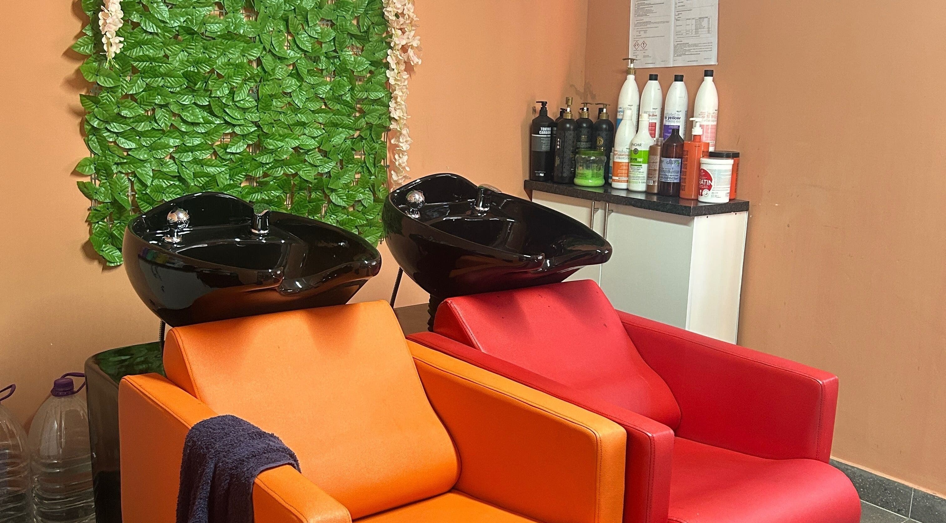 Modern hair wash stations at Excelle Hair Clinic And Training, Cape Town, Western Cape, ZA.