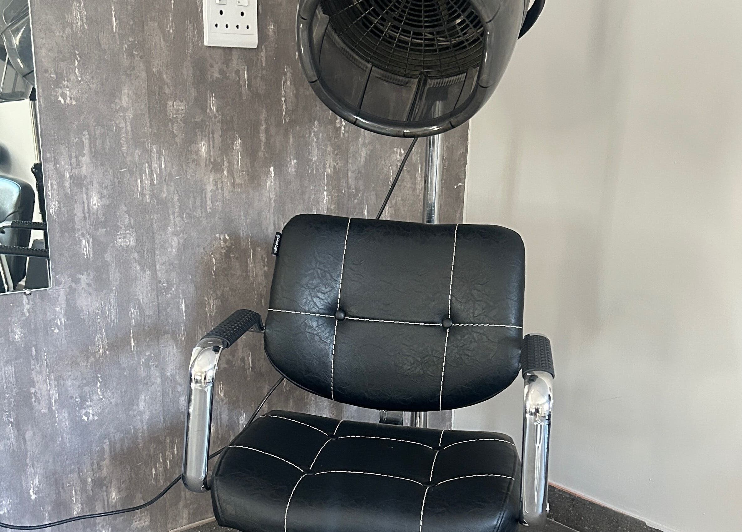 Comfortable salon chair at Excelle Hair Clinic And Training, Cape Town, Western Cape, ZA.