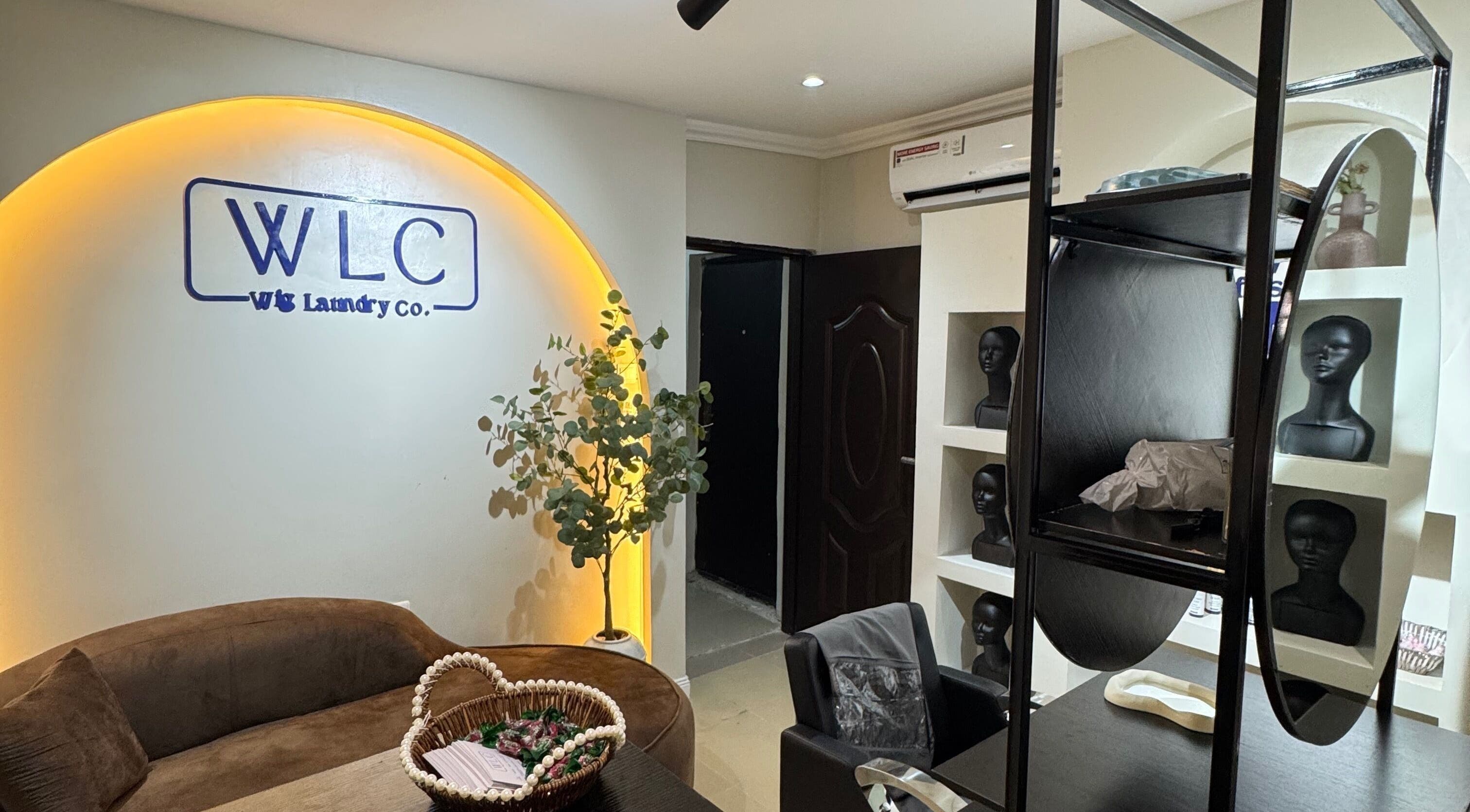 Interior of Wig Laundry Company in Lagos with cozy seating and stylish decor.