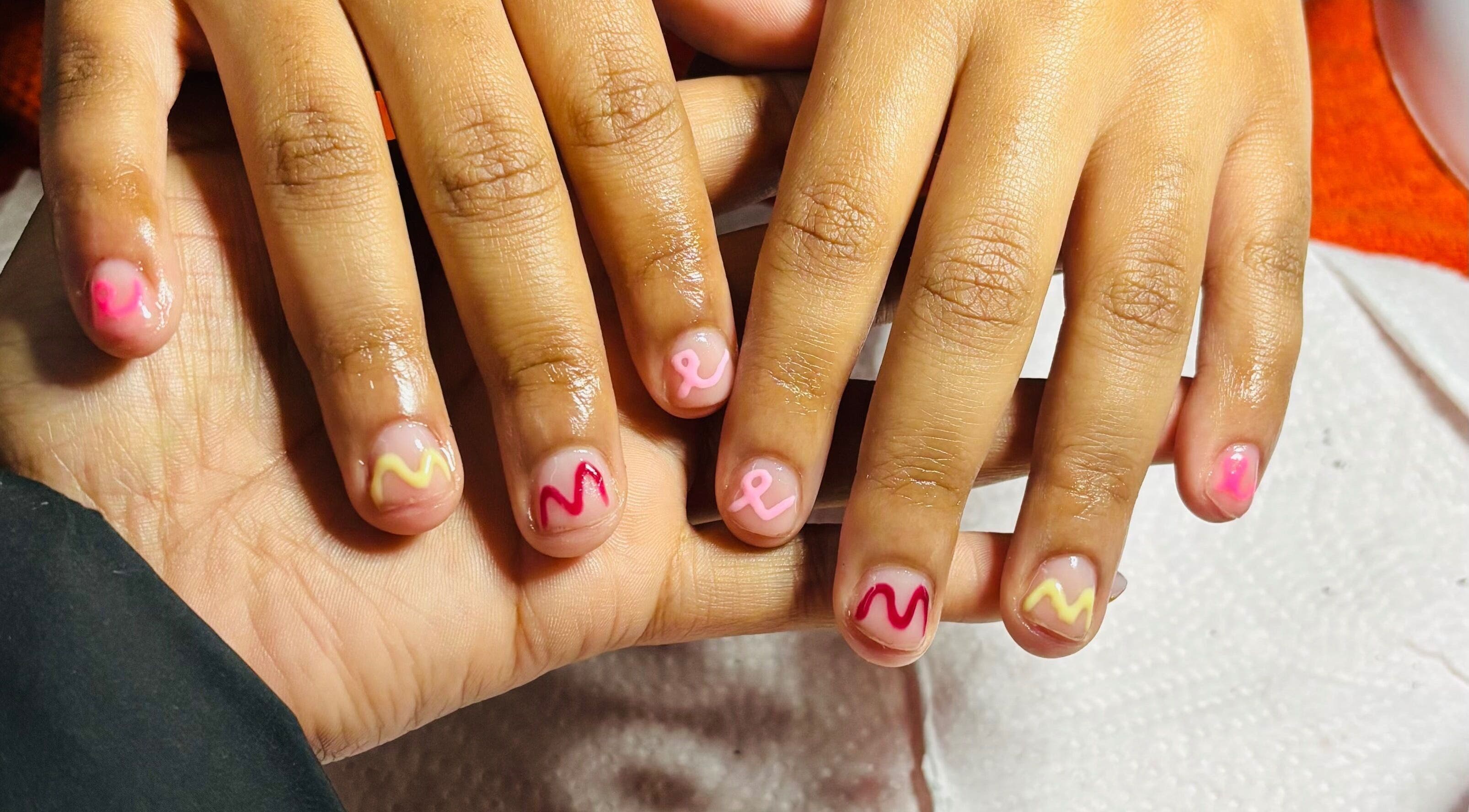 Vibrant nail art at Mani & Pedi Haven, Gqeberha, Eastern Cape, ZA. Perfect for a stylish manicure.