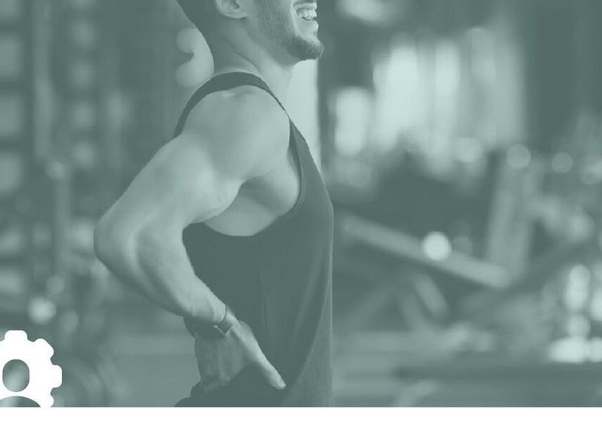 Person stretches at My Body Mechanic gym, Manchester, England, GB, highlighting wellness and fitness.