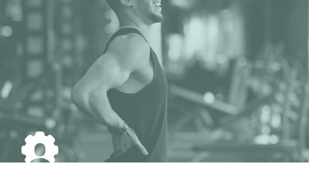 Person stretches at My Body Mechanic gym, Manchester, England, GB, highlighting wellness and fitness.