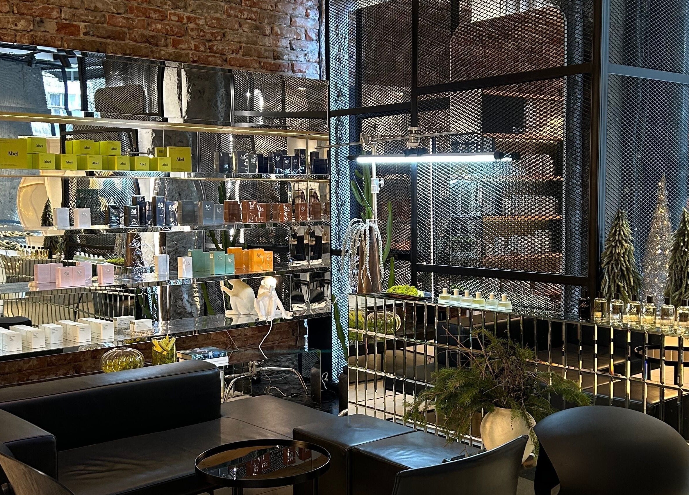 Chic interior of Koncept Beauty in Sofia, showcasing luxurious products on sleek shelves.