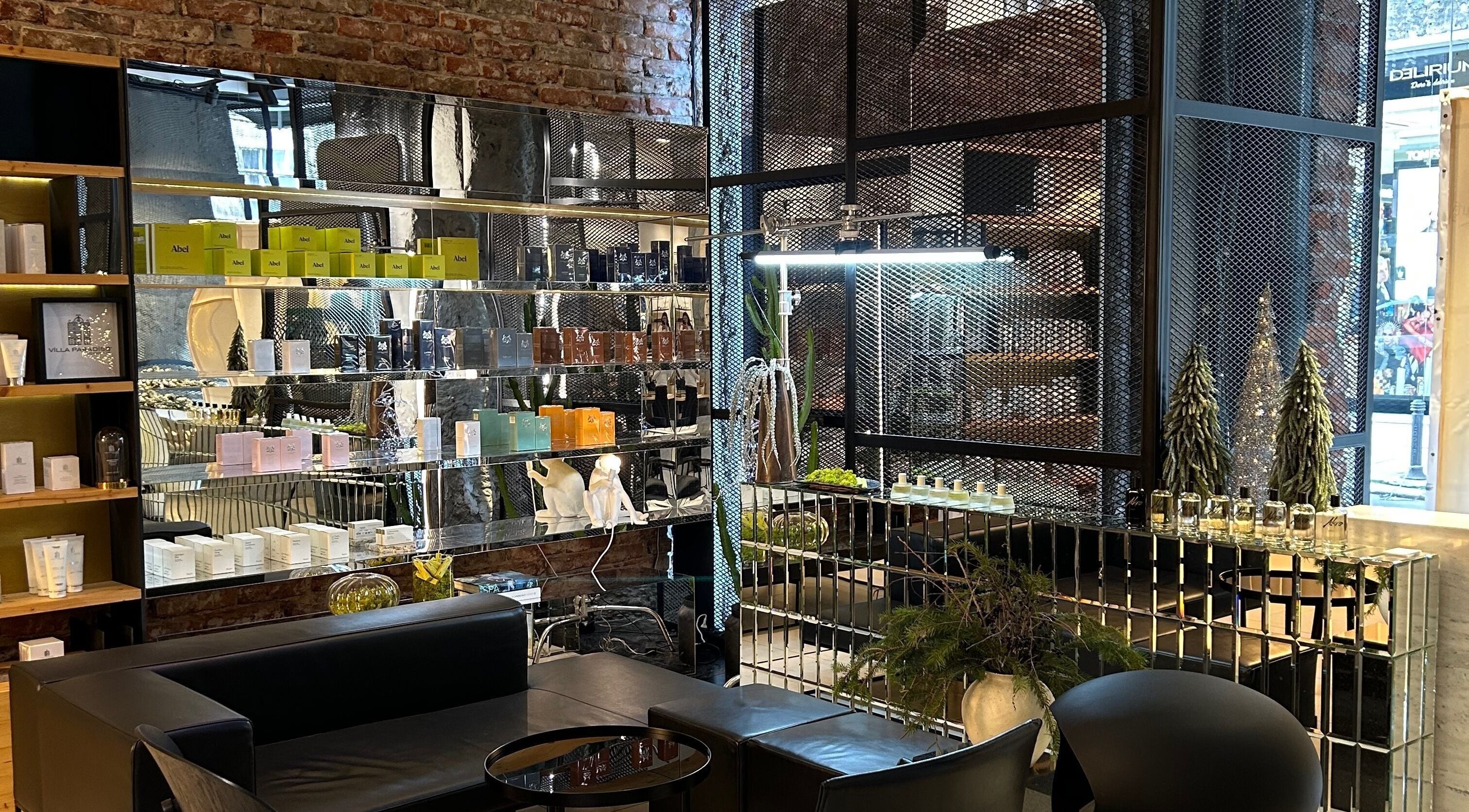 Chic interior of Koncept Beauty in Sofia, showcasing luxurious products on sleek shelves.