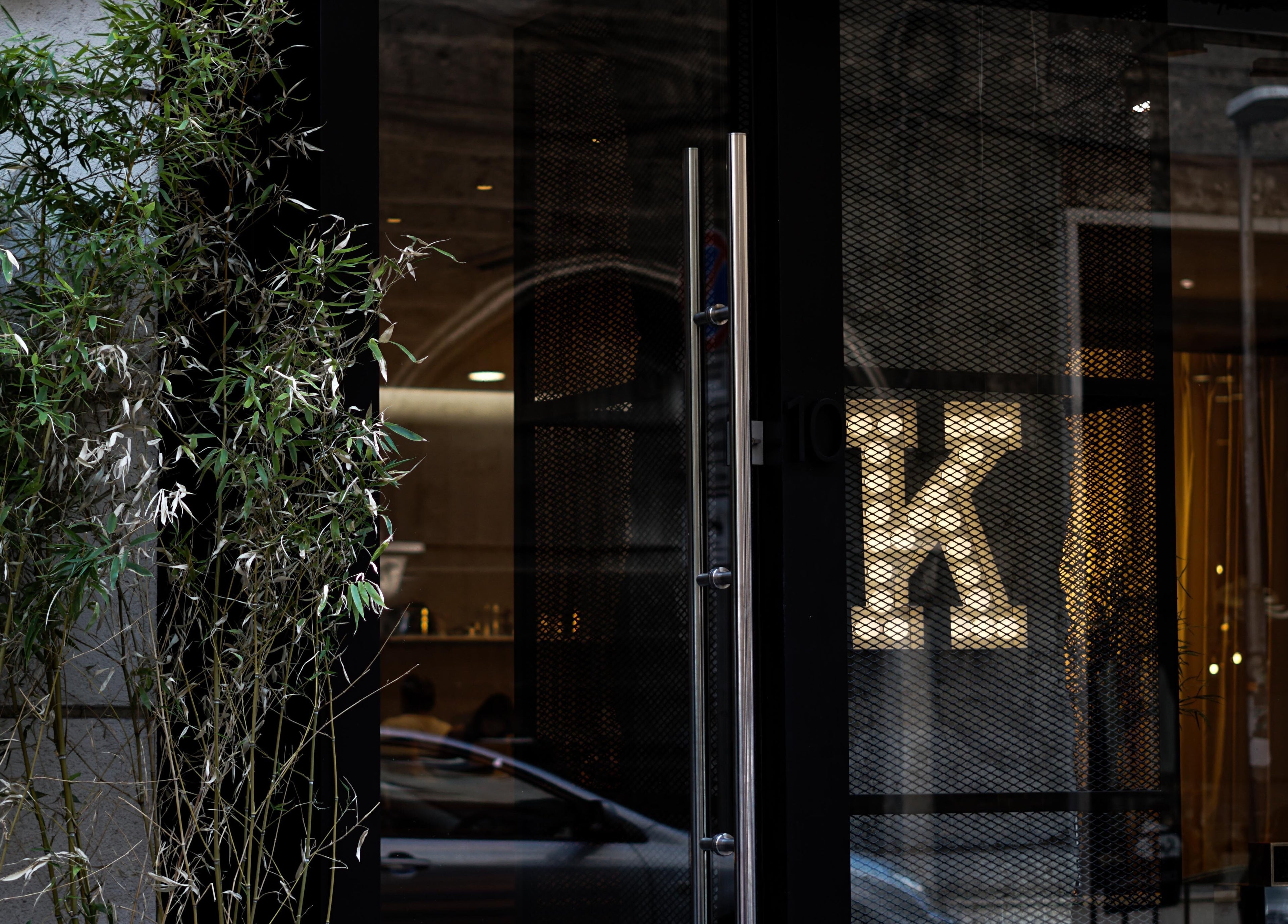 Entrance of Koncept Beauty in Sofia, Sofia City Province, BG with modern design and greenery.