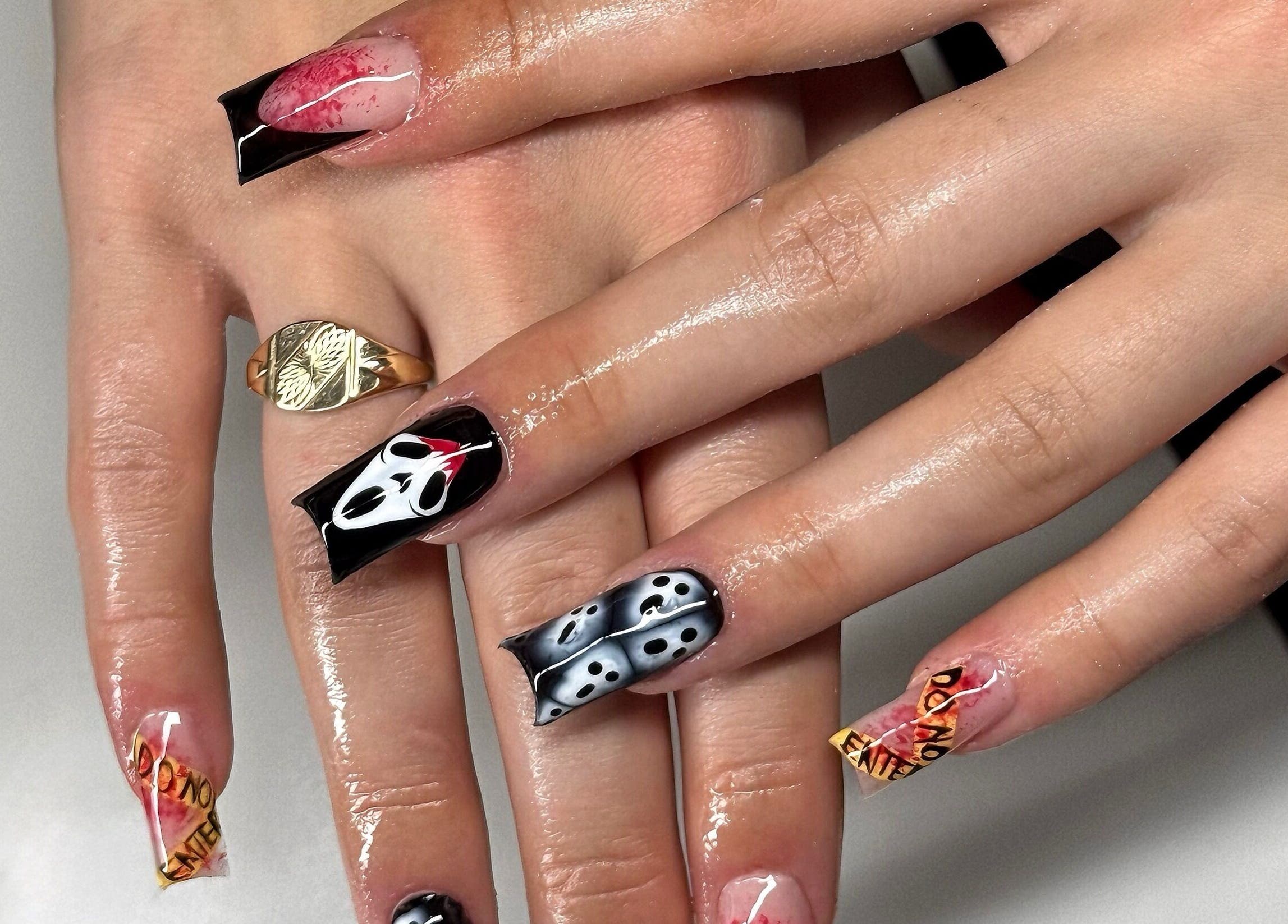 Creative nail art design at Leasnailhub, Peterborough, England, GB featuring bold, graphic patterns.
