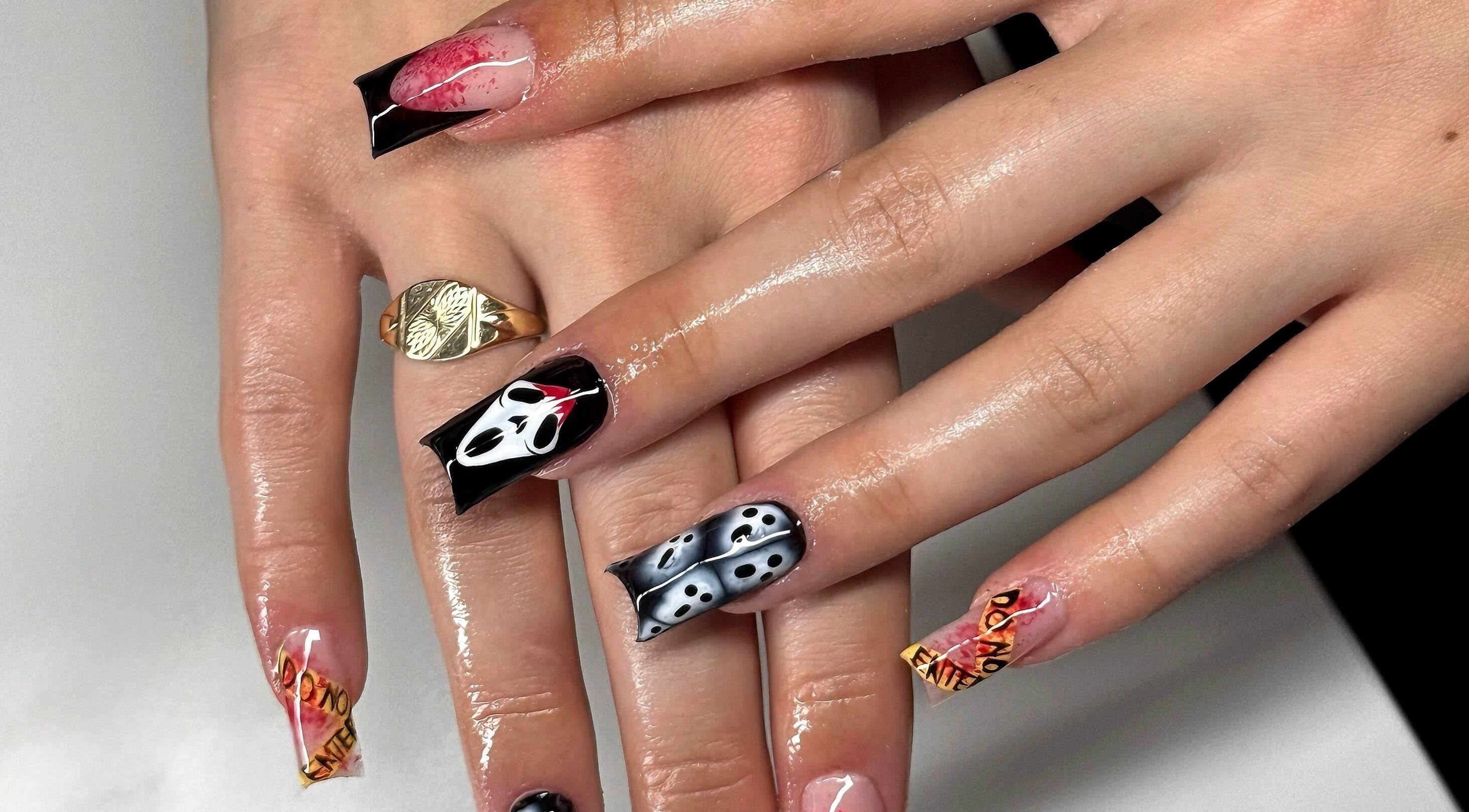 Creative nail art design at Leasnailhub, Peterborough, England, GB featuring bold, graphic patterns.