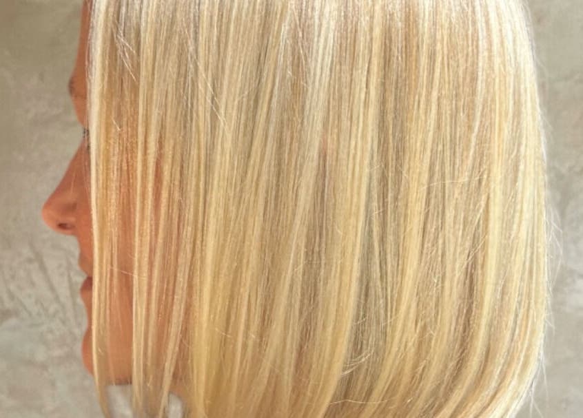 Side view of a sleek blonde bob hairstyle at milenadrwecka.hair, London, England, GB.