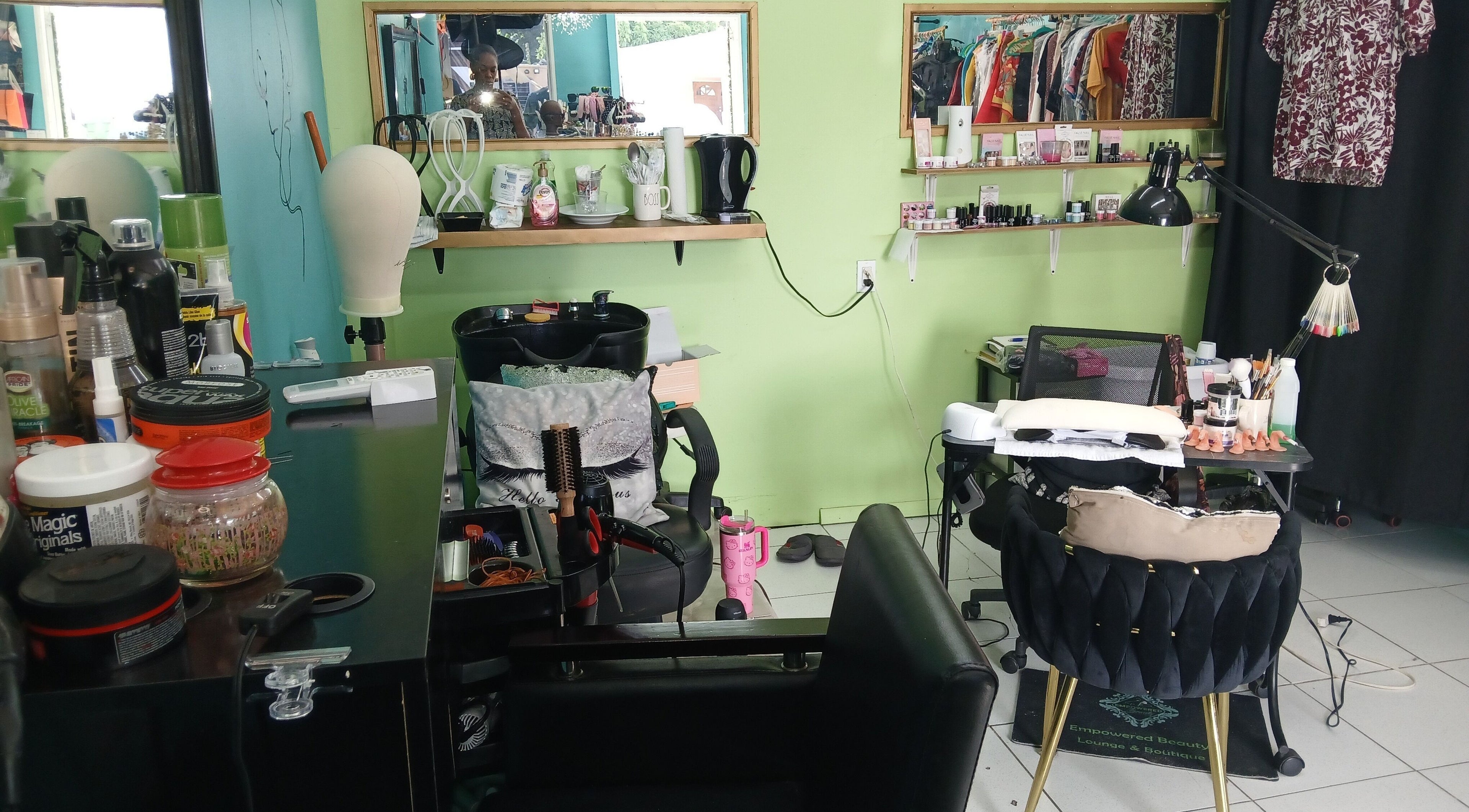 Interior of Ma Belle Essence Beauty Salon & Boutique, Philipsburg, showcasing stylish setup next to Flaco Cafe, SX.