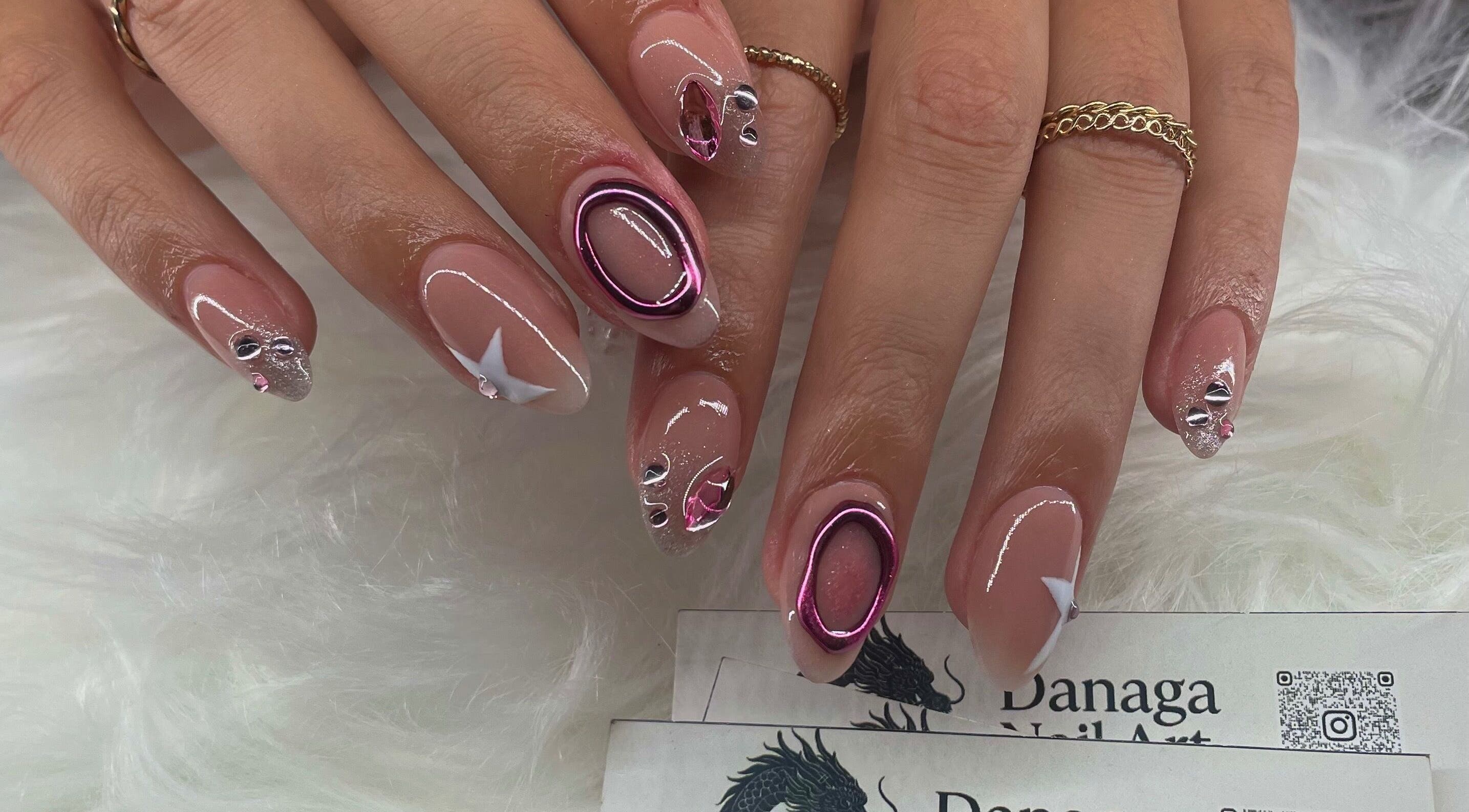 Elegant gel nail art with gemstones at Danaga Studio, Chihuahua, Chihuahua, MX.