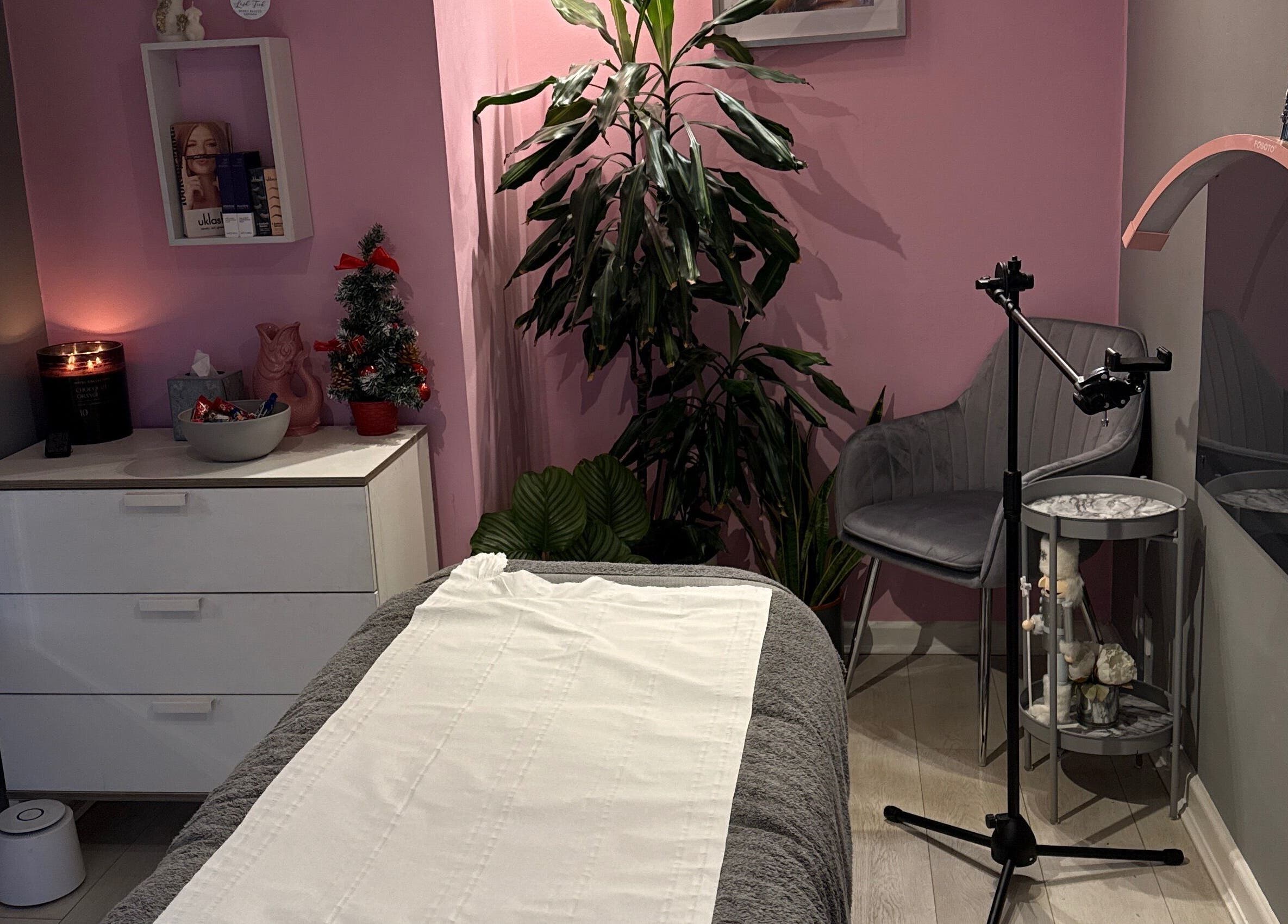 Relaxing treatment room at Winks Beauty London, inviting decor in London, England, GB enhances your wellness experience.