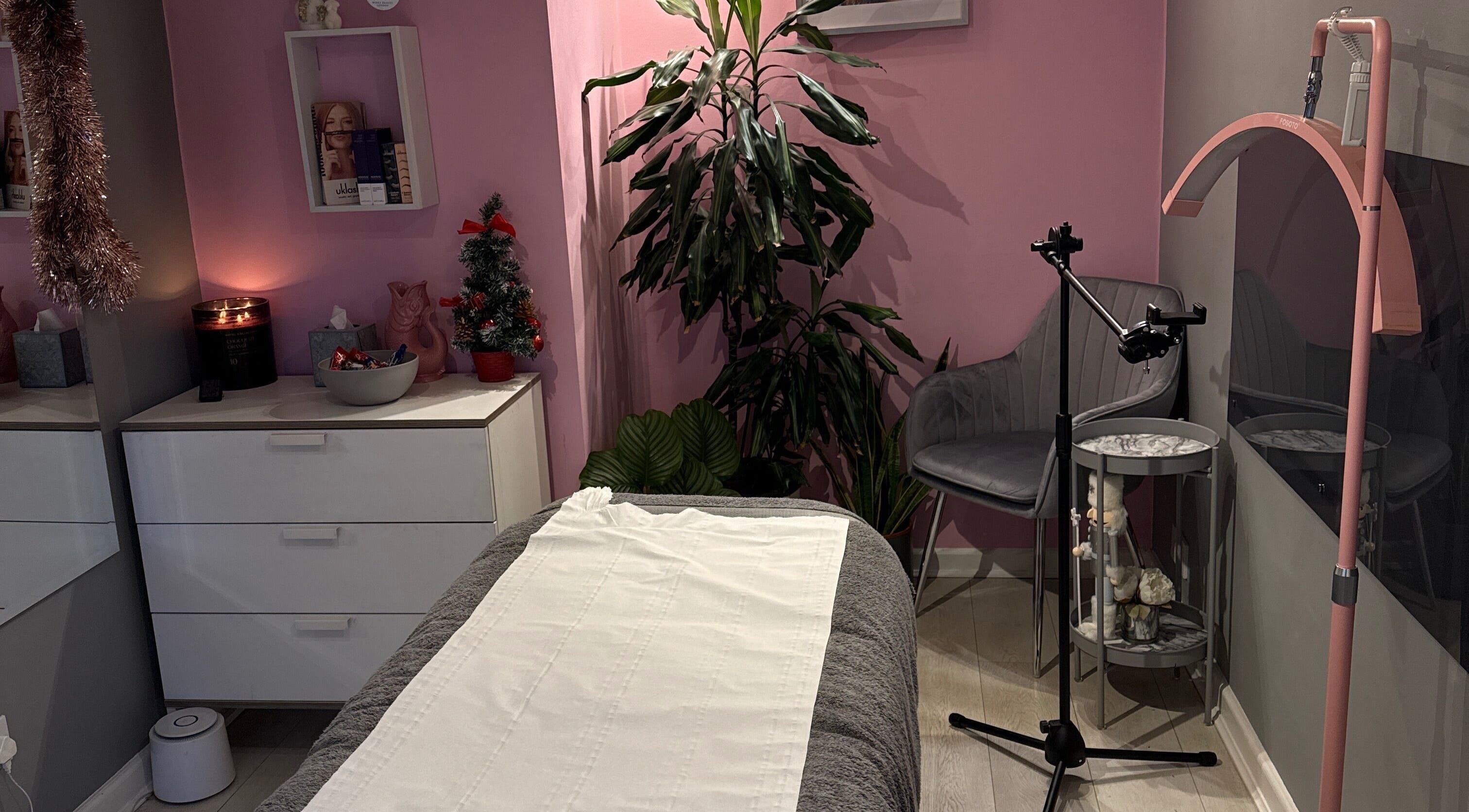Relaxing treatment room at Winks Beauty London, inviting decor in London, England, GB enhances your wellness experience.