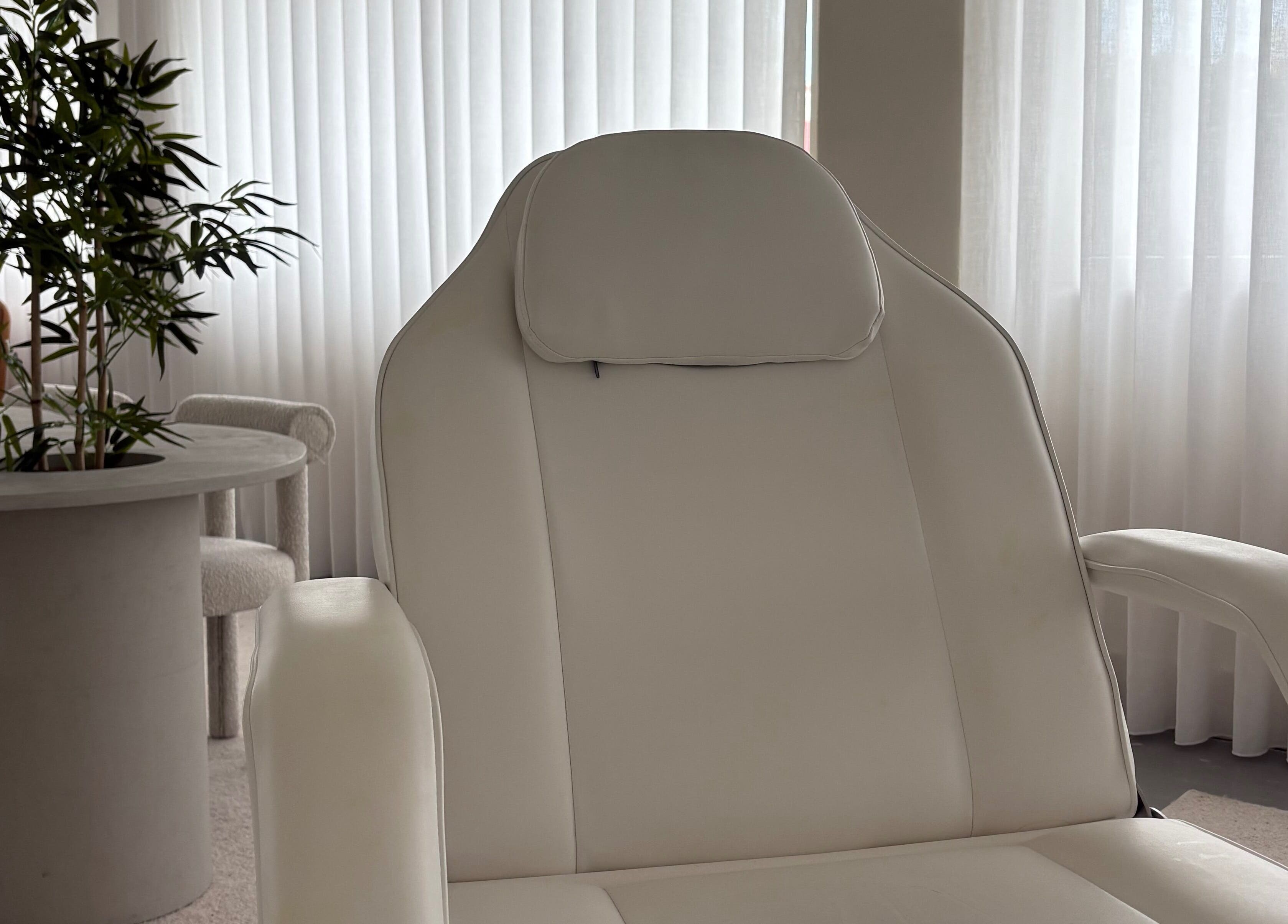 Elegant spa chair at A-Derma, Funchal, Madeira, PT offering a luxurious wellness experience.
