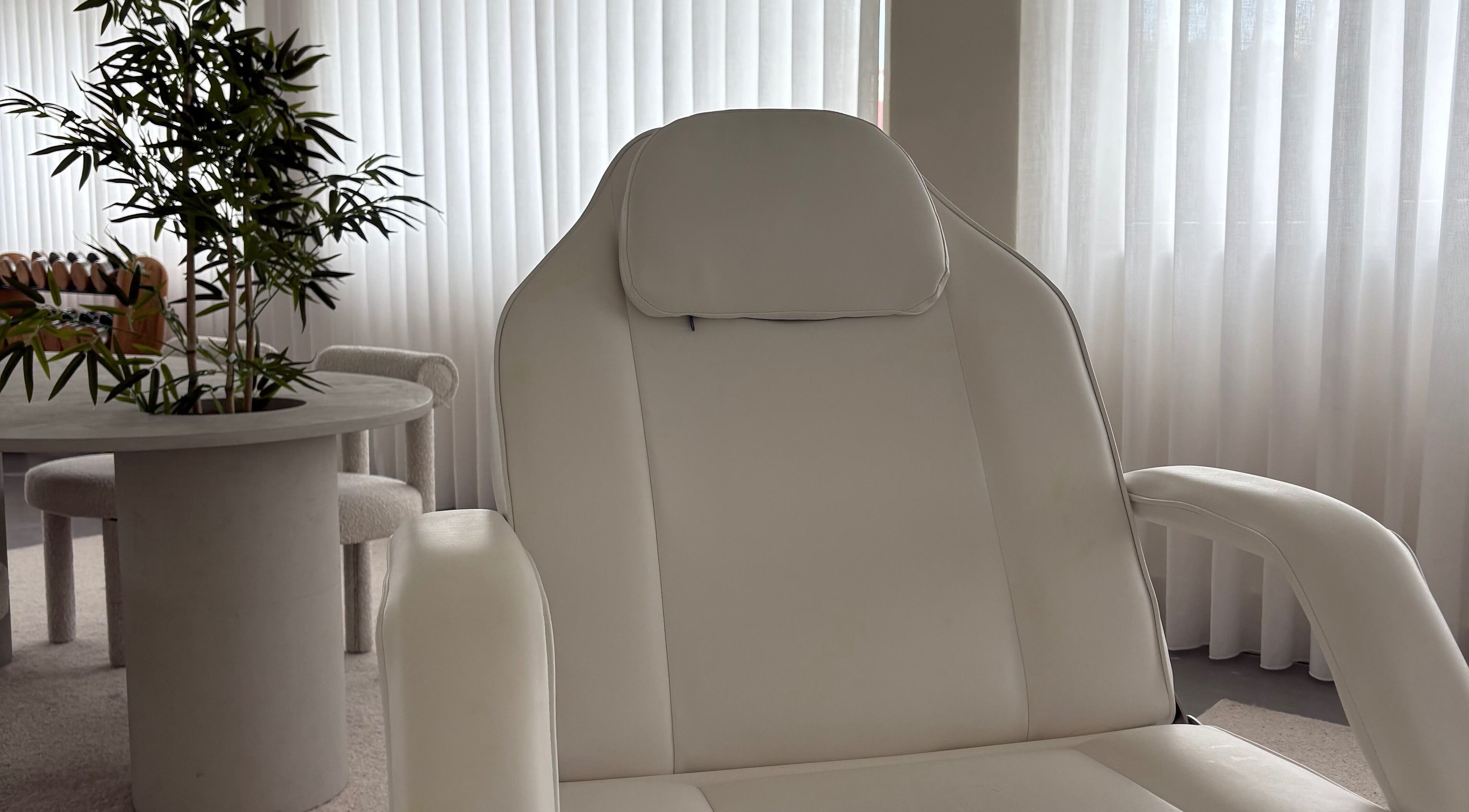 Elegant spa chair at A-Derma, Funchal, Madeira, PT offering a luxurious wellness experience.