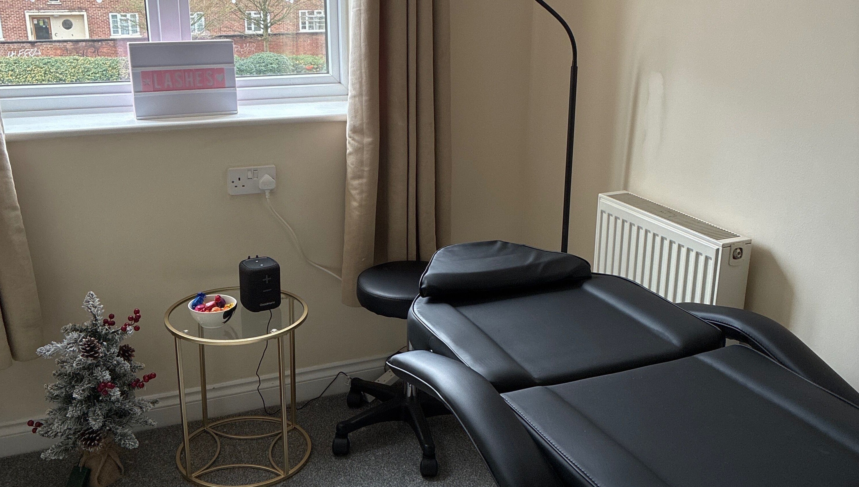 Lash treatment room at Caitlin McGarel Beauty in Southampton, England, GB with a cozy setup.