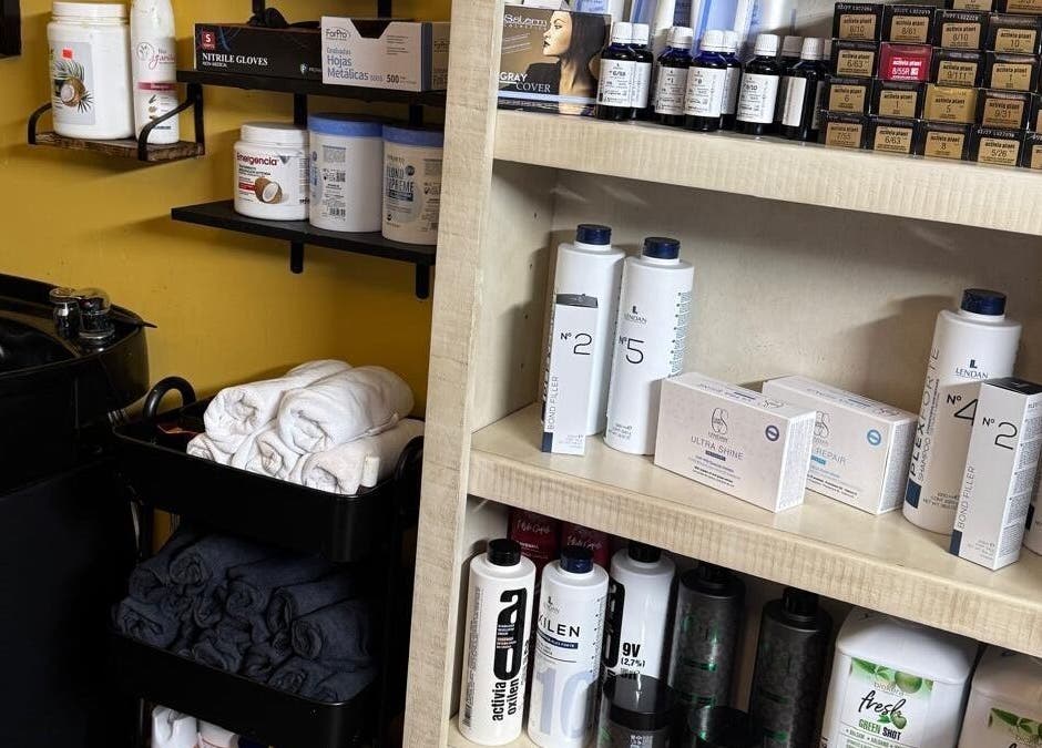 Hair products and towels at Kairos Dominican Hair Salon, Dallas, North Carolina, US.