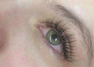 Close-up of eye with lush lashes at Anila's Lashes in Ottawa, Ontario, CA.