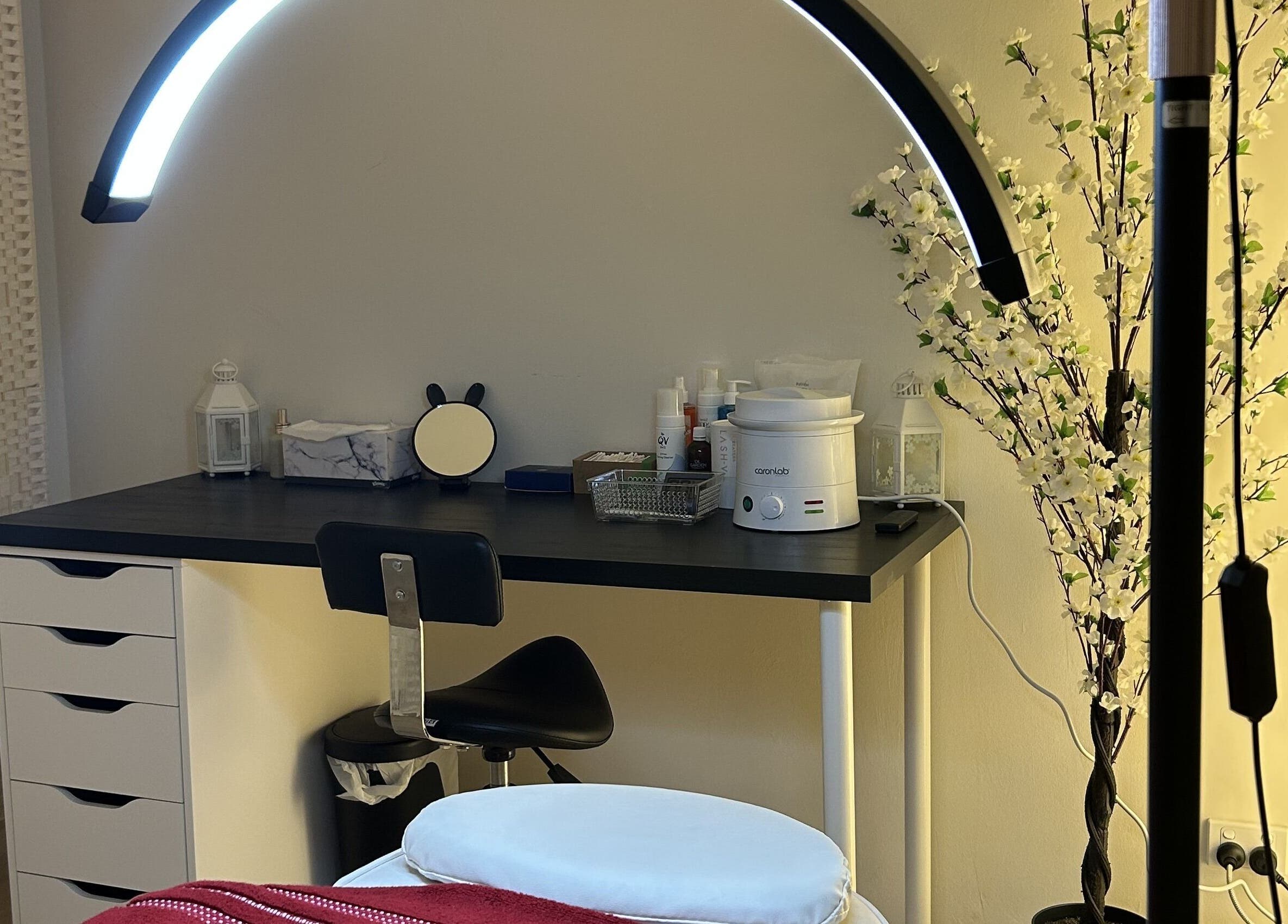 Relaxing beauty treatment room at Velvet Touch Brows in Kinross, Western Australia, AU, featuring a lit-up workspace.