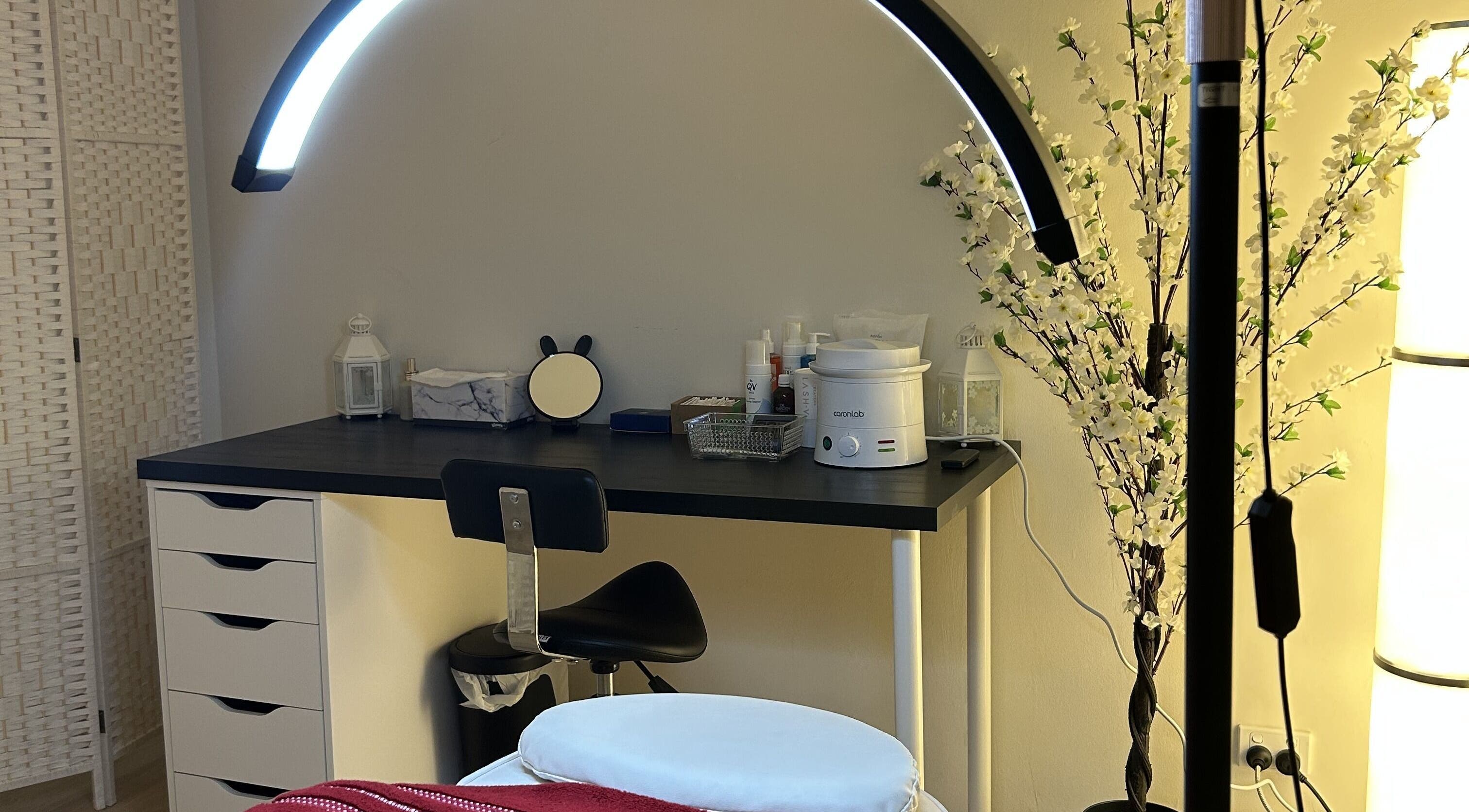 Relaxing beauty treatment room at Velvet Touch Brows in Kinross, Western Australia, AU, featuring a lit-up workspace.