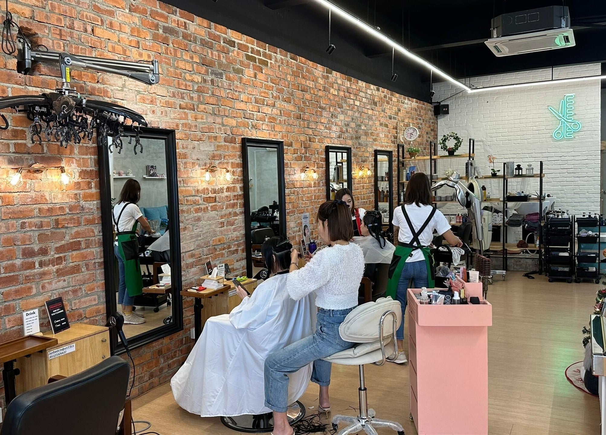 Inside Su by jenice hair, Petaling Jaya, Selangor, MY: stylish salon interior with clients and stylists.