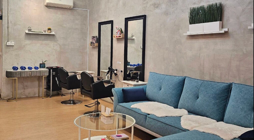 Chic interior of Su By Jenice Hair in Petaling Jaya, Selangor, MY showcasing luxury seating and styling stations.