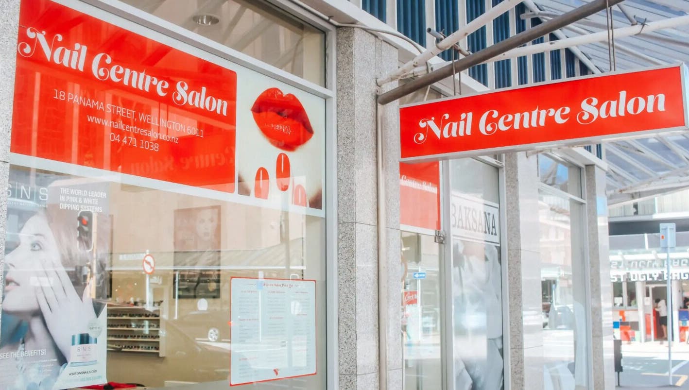 Bright exterior of Nail Centre Salon, Wellington, Wellington Region, NZ showcasing vibrant signage.