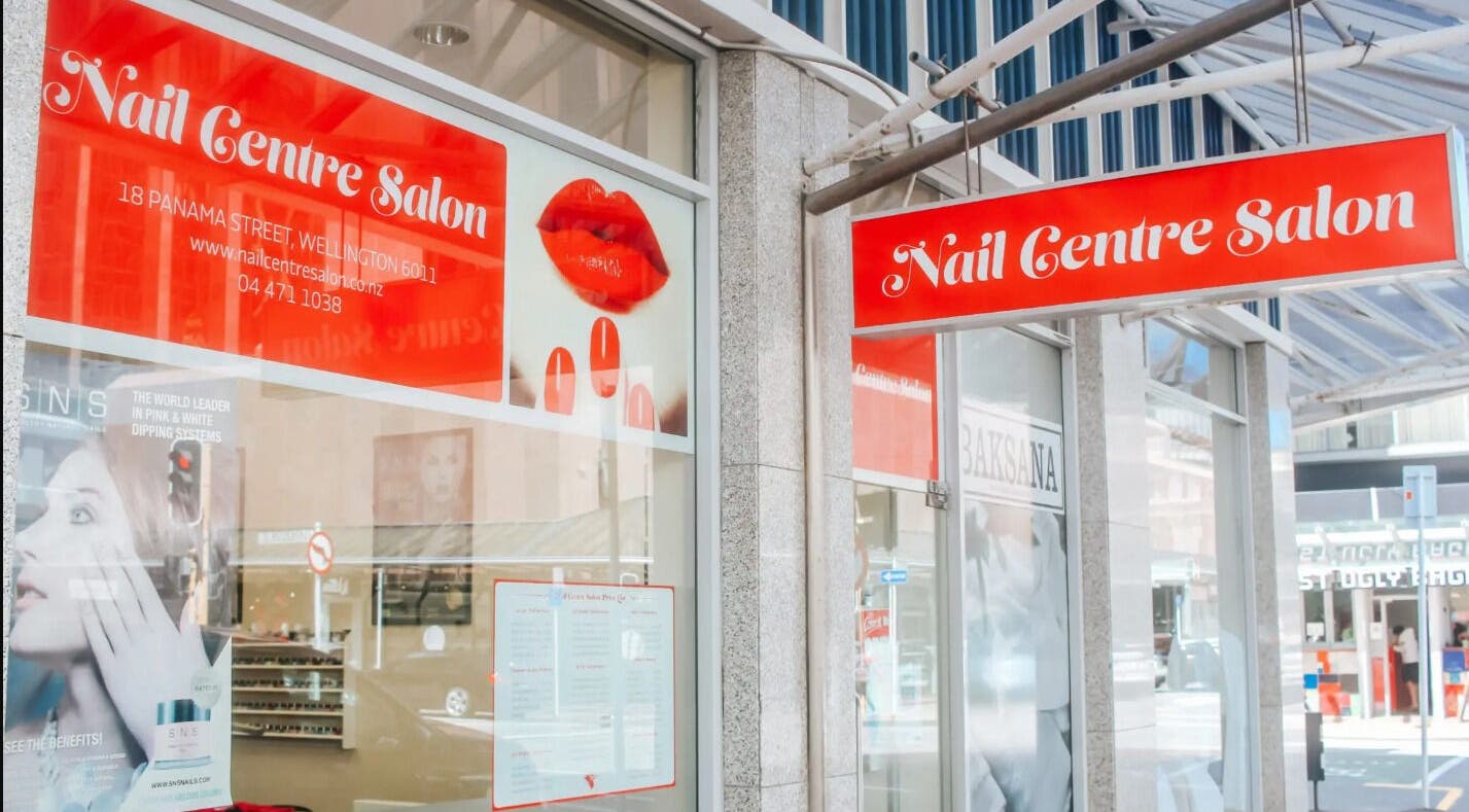 Bright exterior of Nail Centre Salon, Wellington, Wellington Region, NZ showcasing vibrant signage.