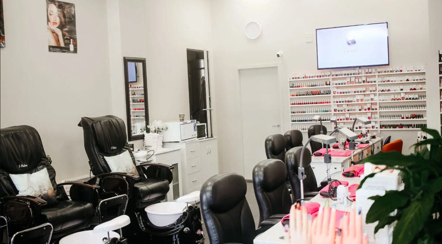 Nail Centre Salon, Wellington NZ interior showcasing manicure stations and pedicure chairs.