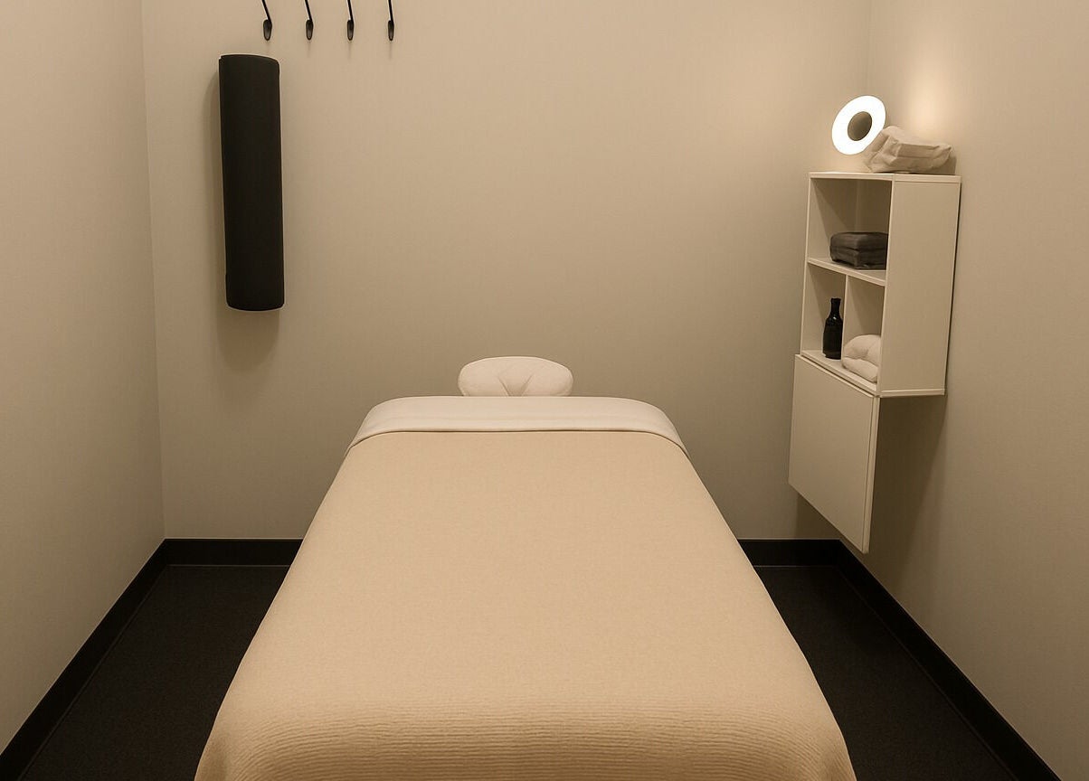 Relaxing massage room at SOLE & SANCTUARY in Vaughan, Ontario, CA with calming lighting and minimalist decor.