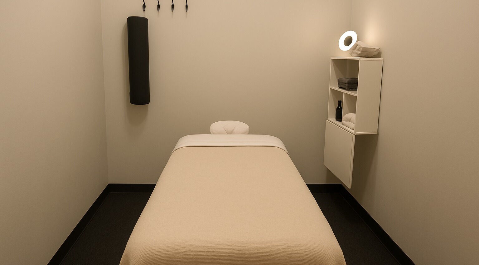 Relaxing massage room at SOLE & SANCTUARY in Vaughan, Ontario, CA with calming lighting and minimalist decor.