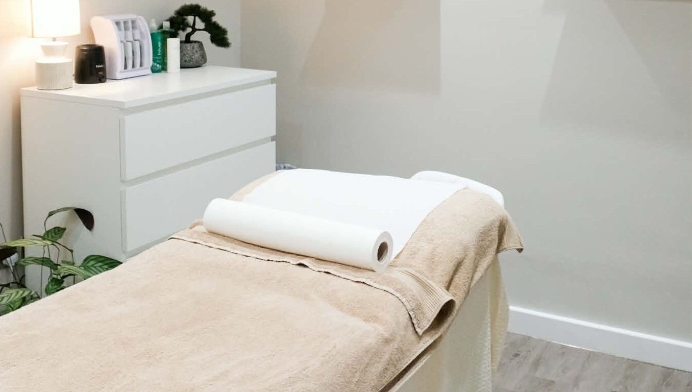 Elegant treatment room at Kaye at Nova, Clitheroe, England, GB, with a cozy massage table.